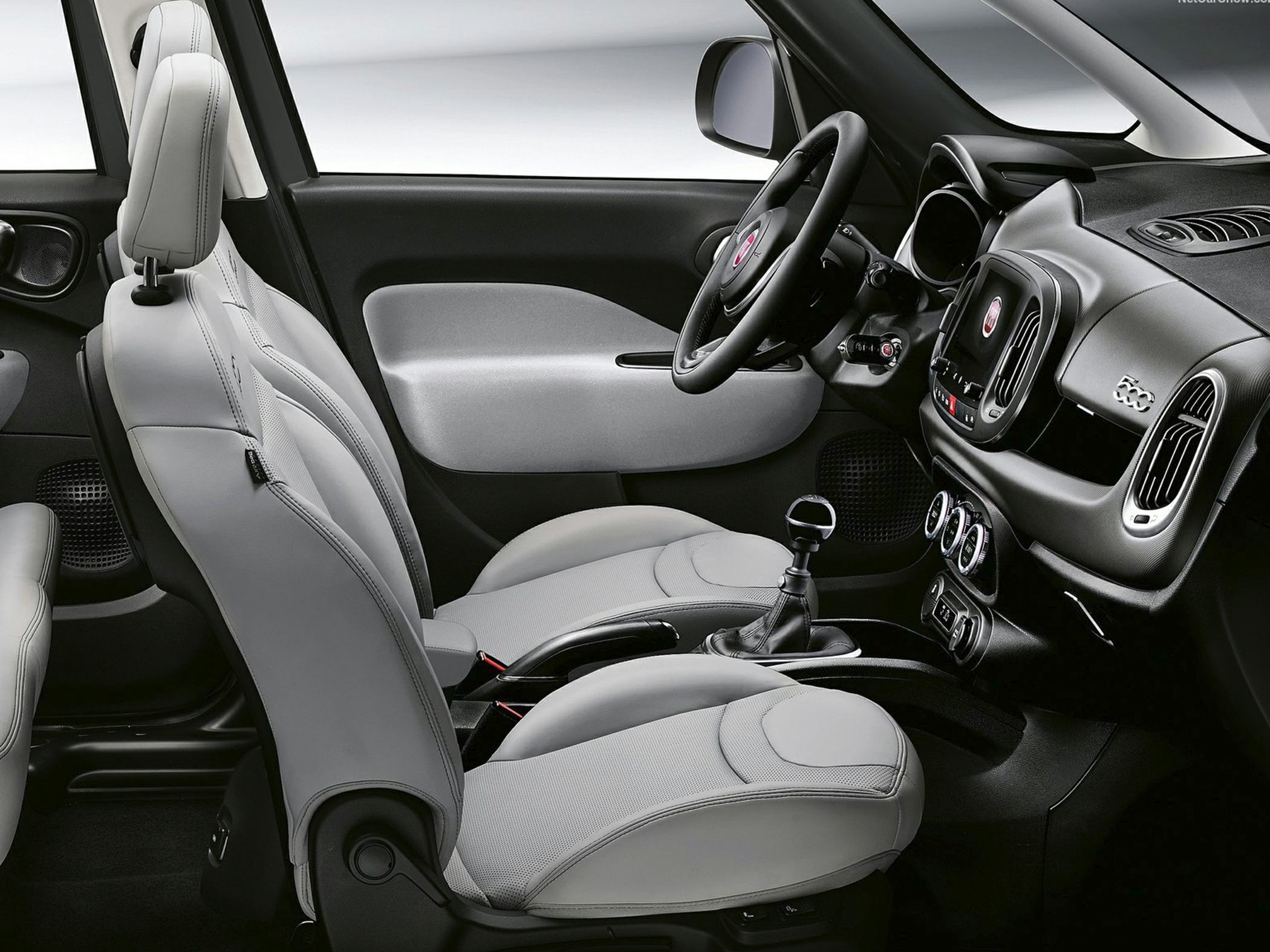 Ergonomic seats and modern dashboard with manual gear shifter