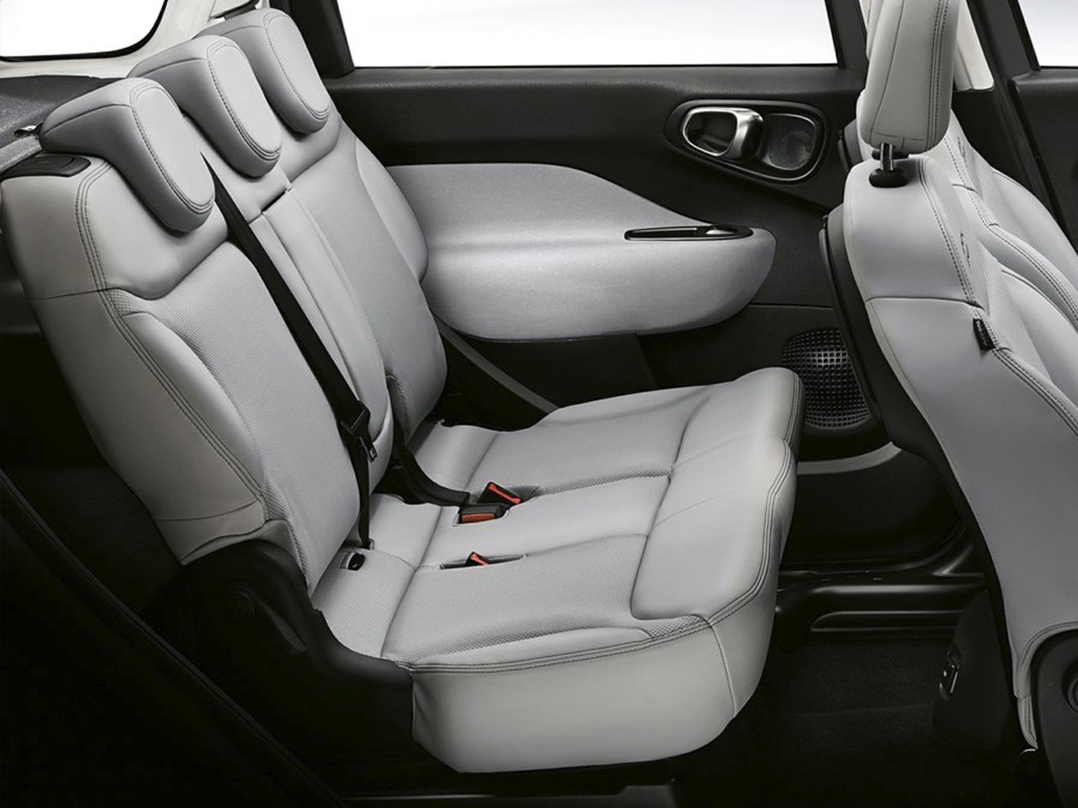 Modern rear seat with leather upholstery and integrated headrests
