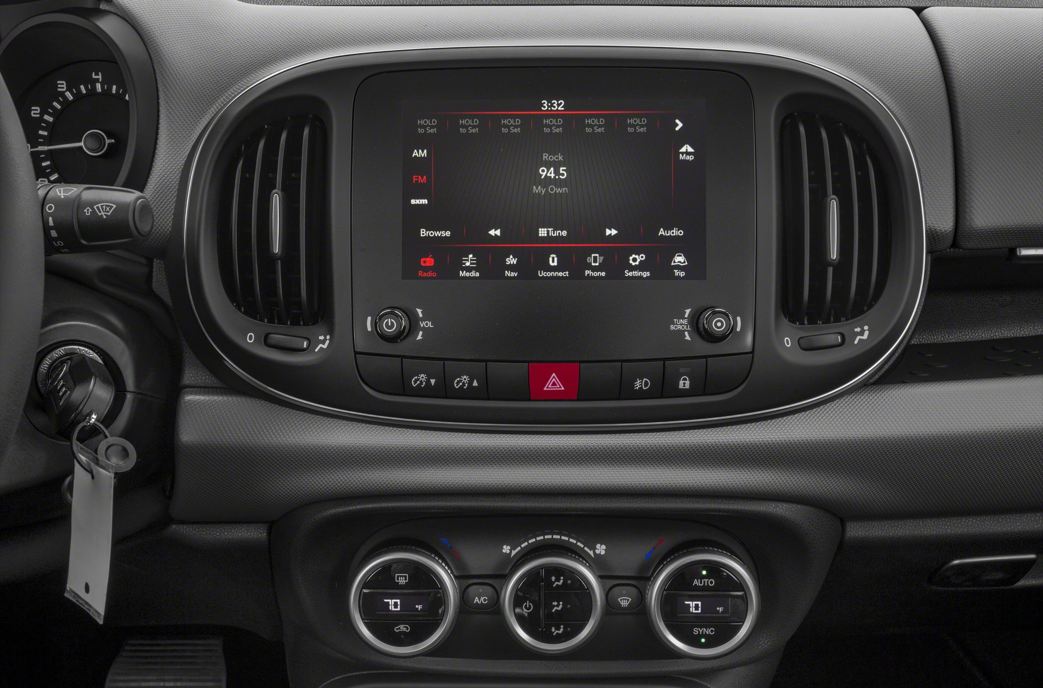 Touchscreen infotainment and climate control knobs on dashboard