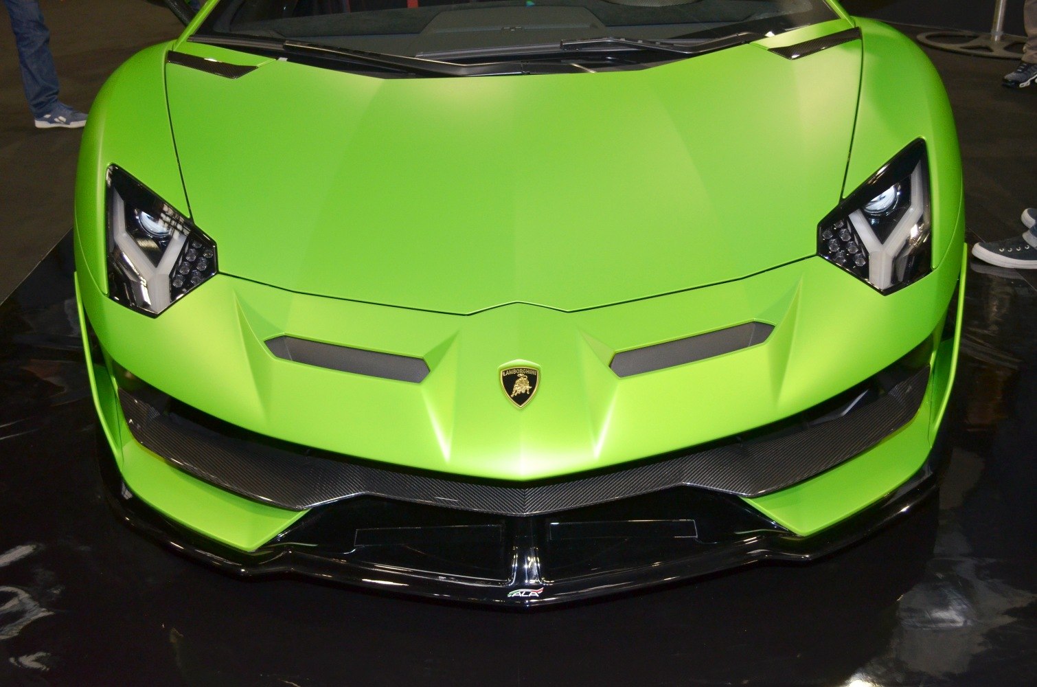 Aggressive front end with Y-shaped LED headlights and aerodynamic carbon fiber details