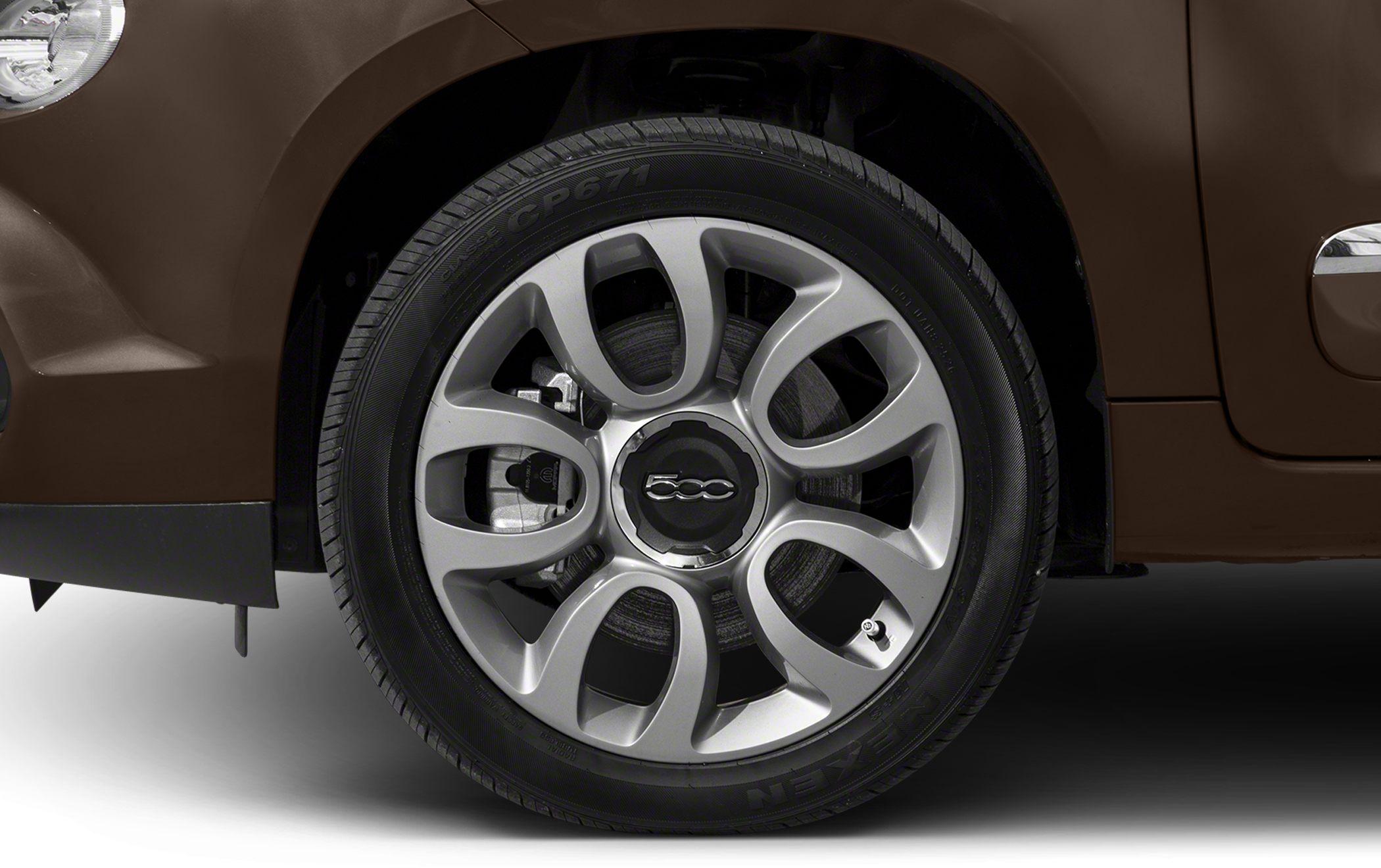 Close-up of alloy wheel and tire with brake disc and caliper.