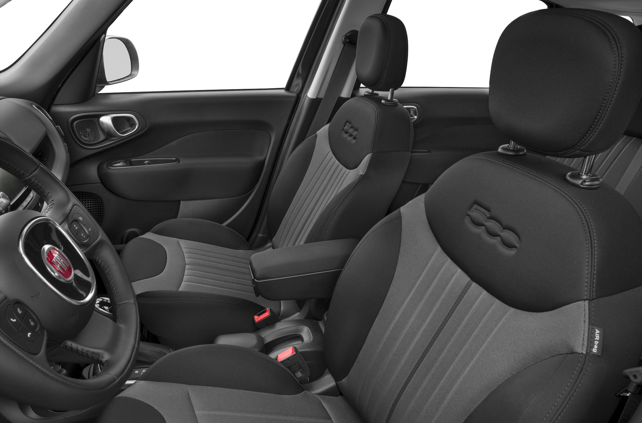 Close-up of front seats and steering wheel with embossed logos.