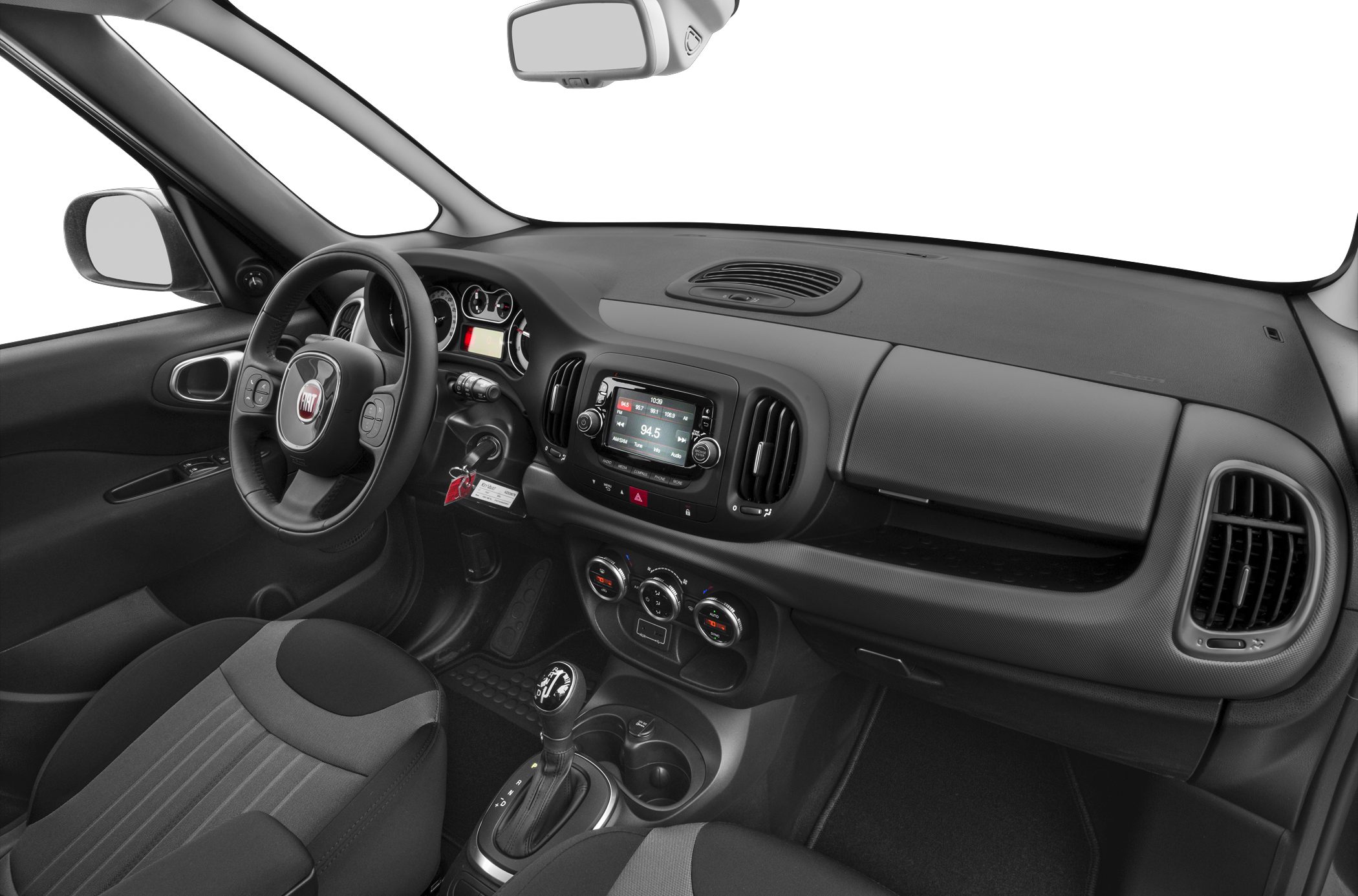 Dashboard, steering wheel, infotainment, and climate controls in a vehicle interior