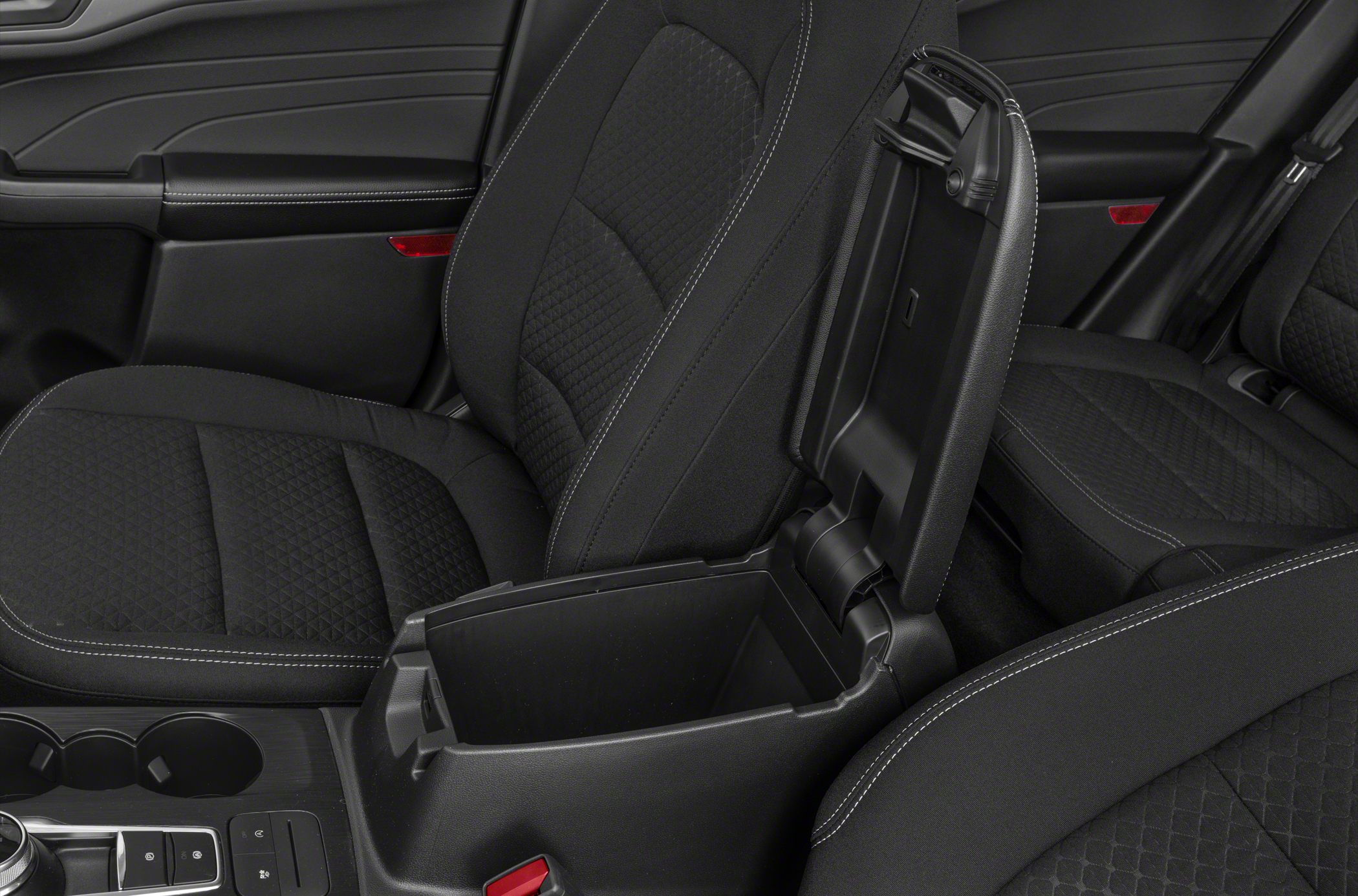 Interior center console storage and quilted fabric car seats