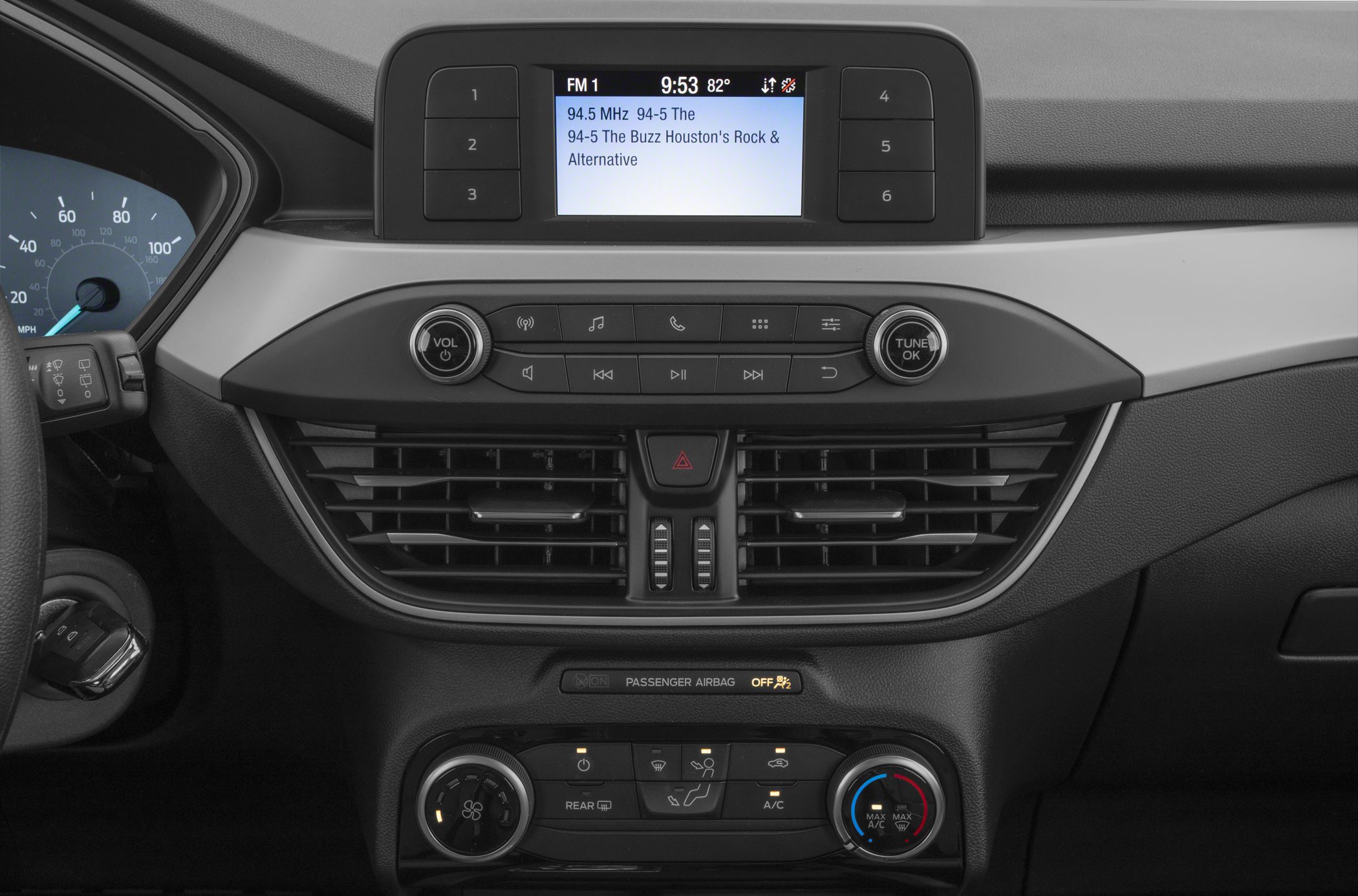 Digital radio display and modern climate control dashboard with vents and knobs