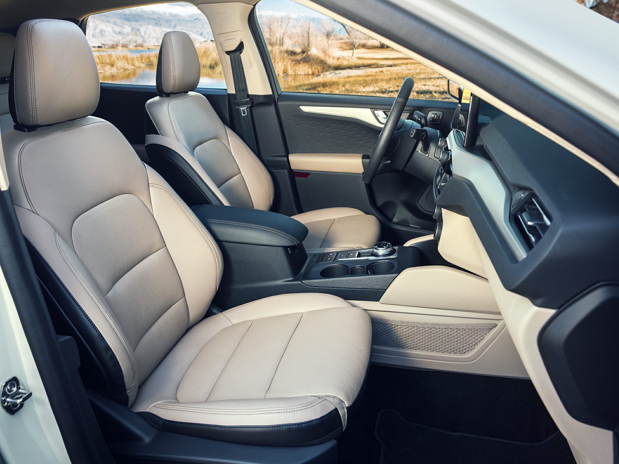 Beige leather seats and modern dashboard with center console