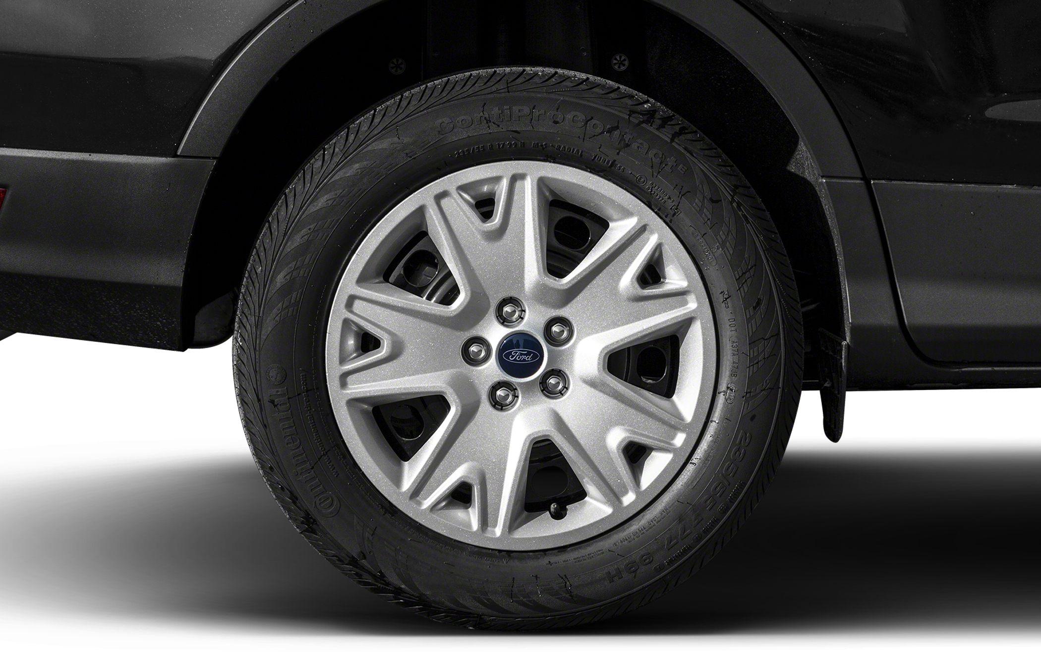 Close-up of alloy wheel rim and tire on SUV