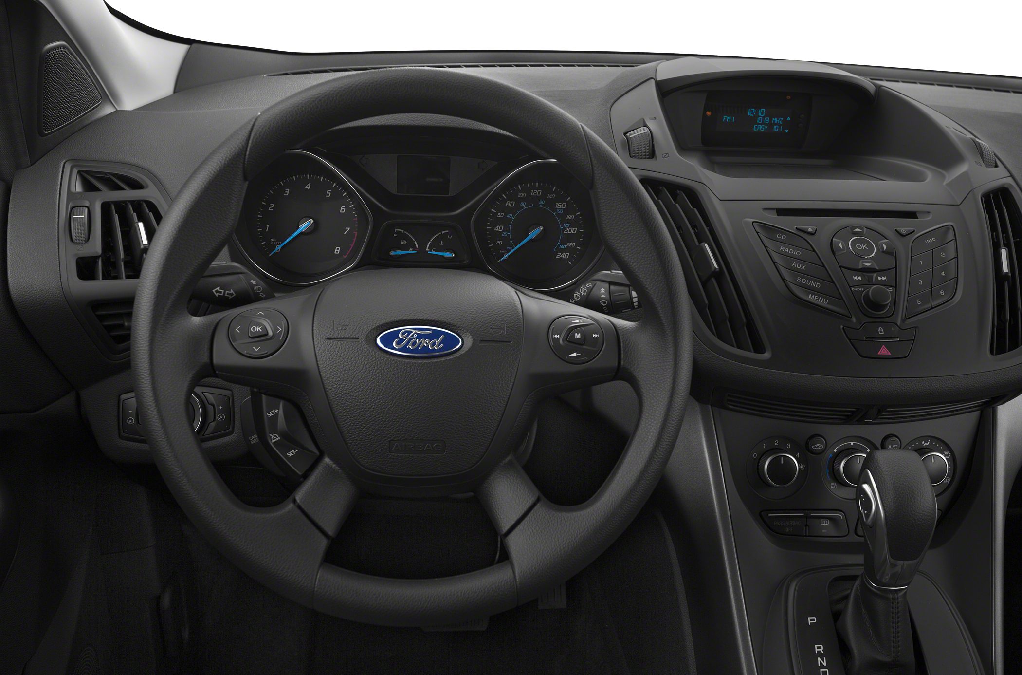 Interior with steering wheel, instrument cluster, and dashboard control panel