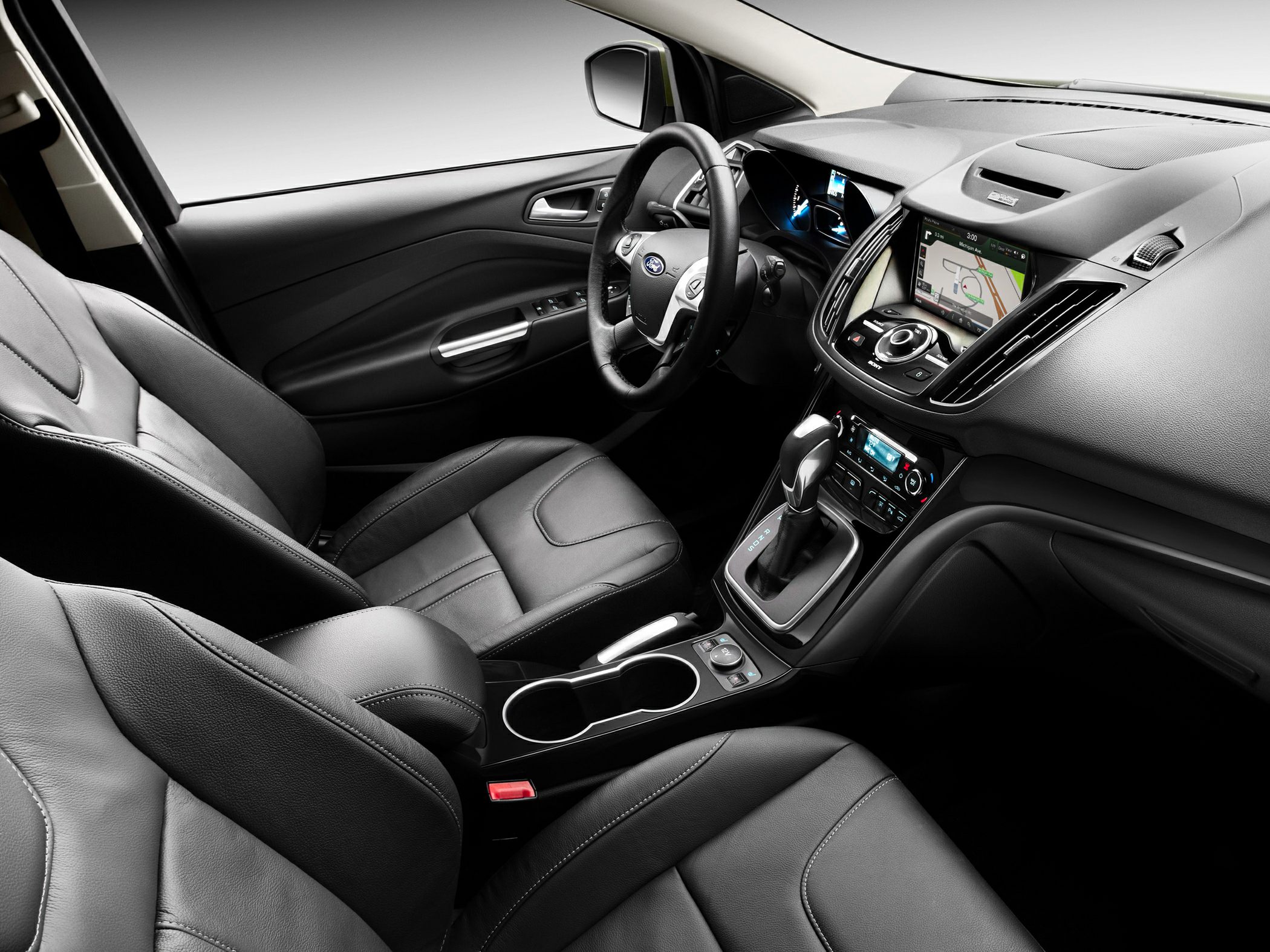 Leather seats, dashboard with touchscreen navigation, and automatic gearshift