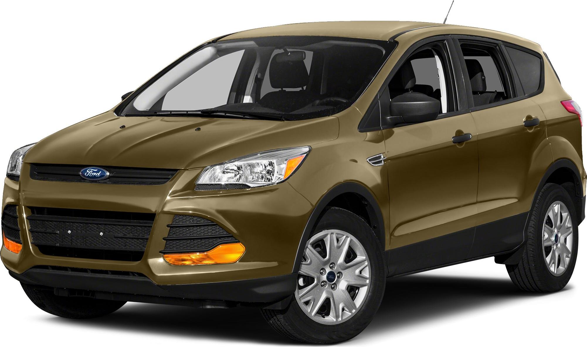 Front side view of brown SUV with grille, headlights, and alloy wheels