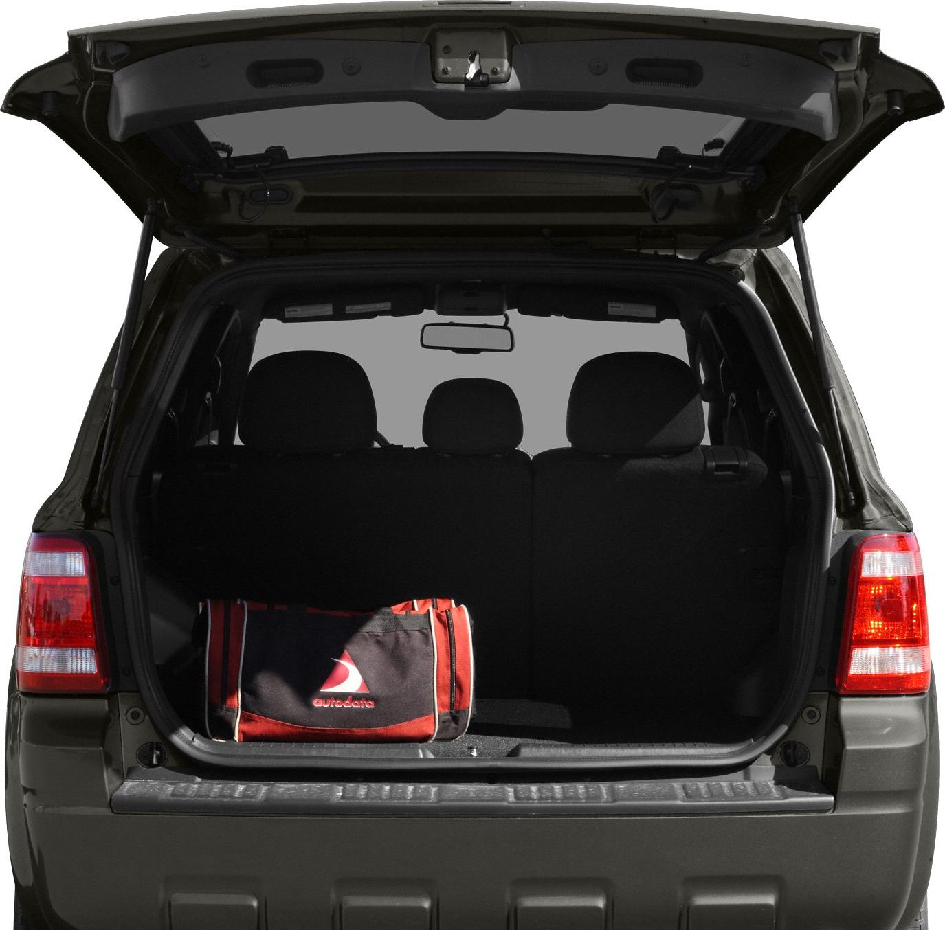Open rear cargo space with tailgate and rear seats visible