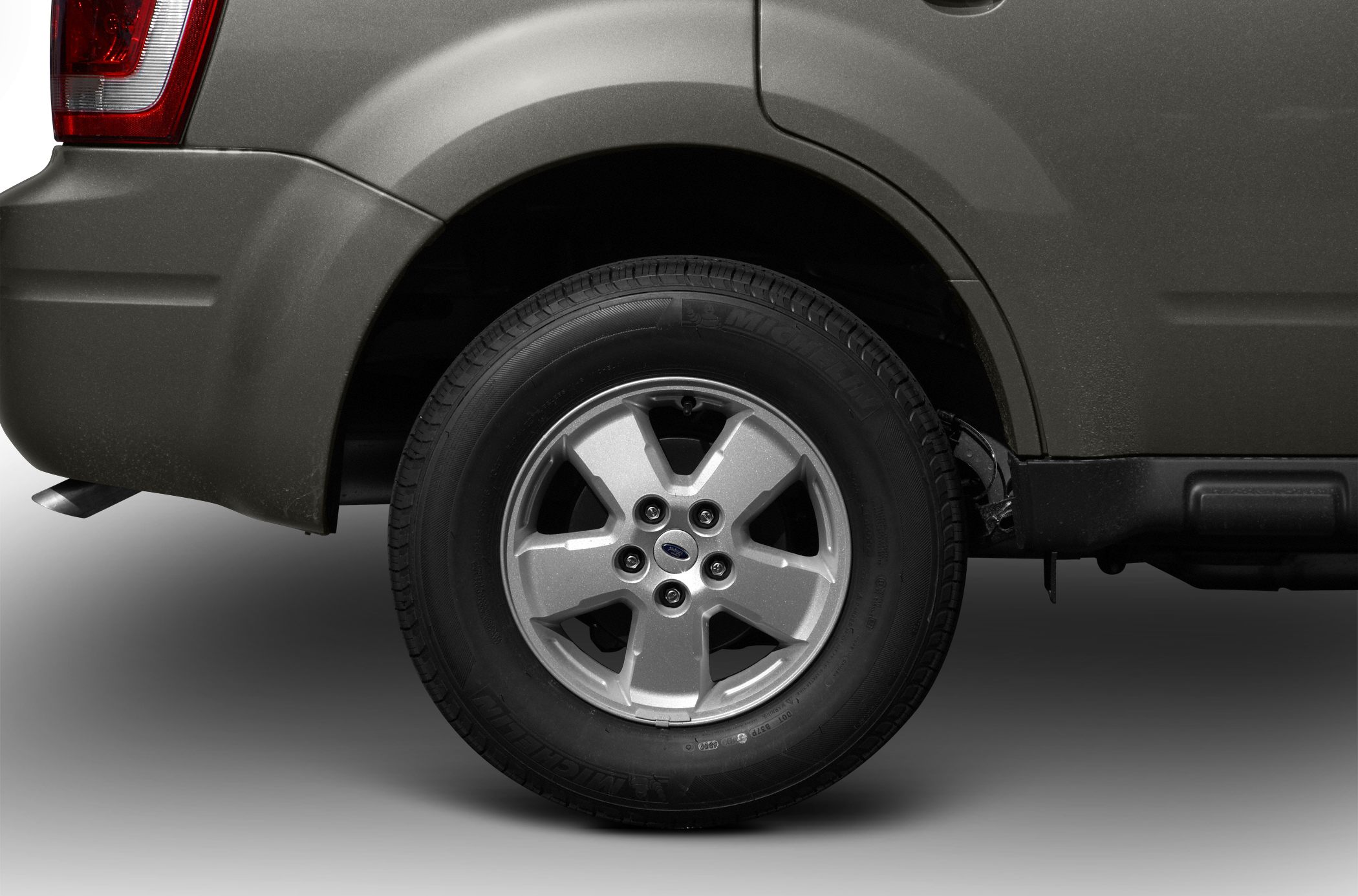 Close-up of rear wheel and fender with alloy wheel design