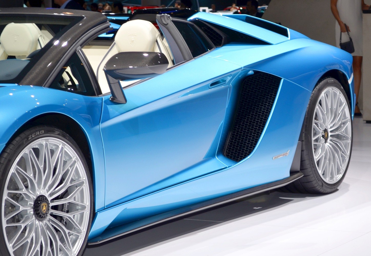 Close-up of side air vent and detailed alloy wheels