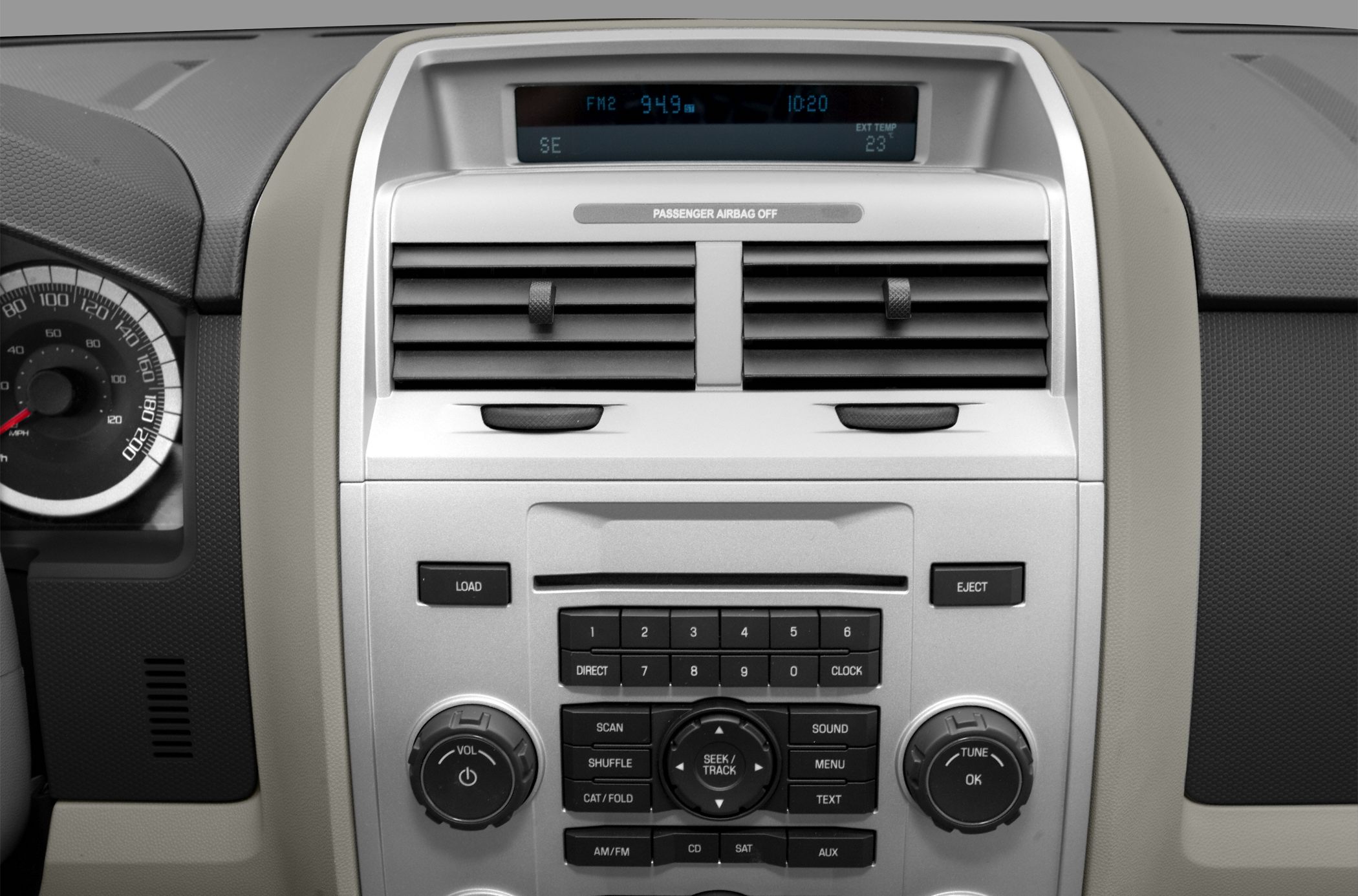 Center console with radio controls, CD slot, and dashboard display