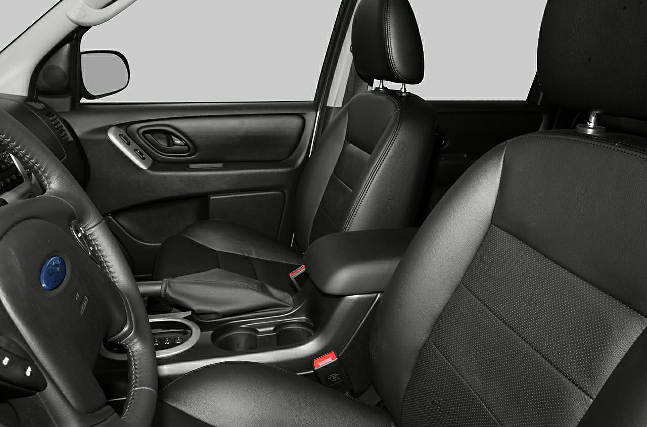 Black leather front seats and dashboard including steering wheel and center console