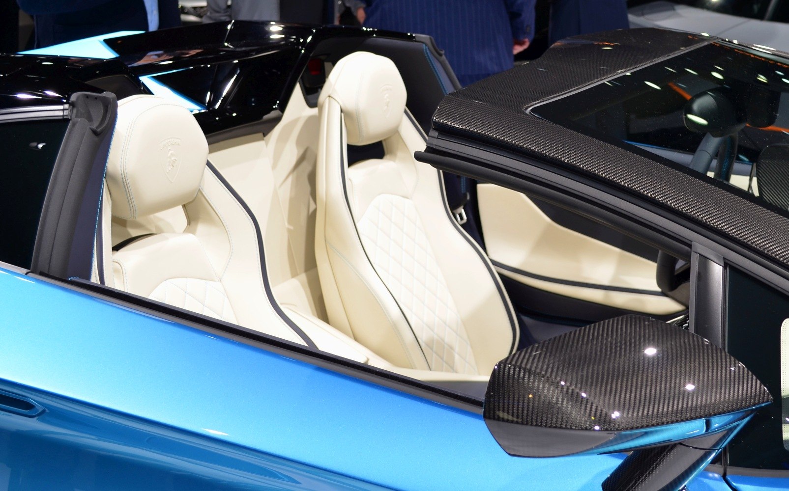 Cream leather seats with diamond stitching and carbon fiber side mirror