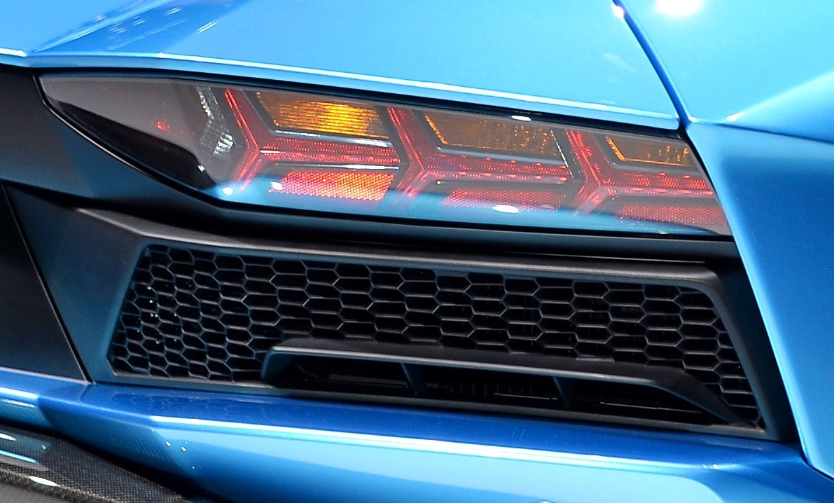 Close-up of rear hexagonal vent and angular taillight design