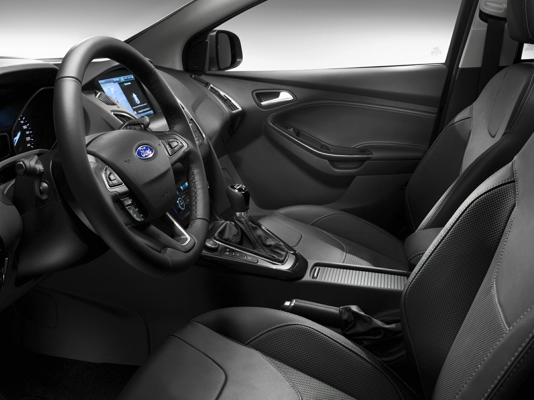 Steering wheel, leather seats, dashboard, gear shift