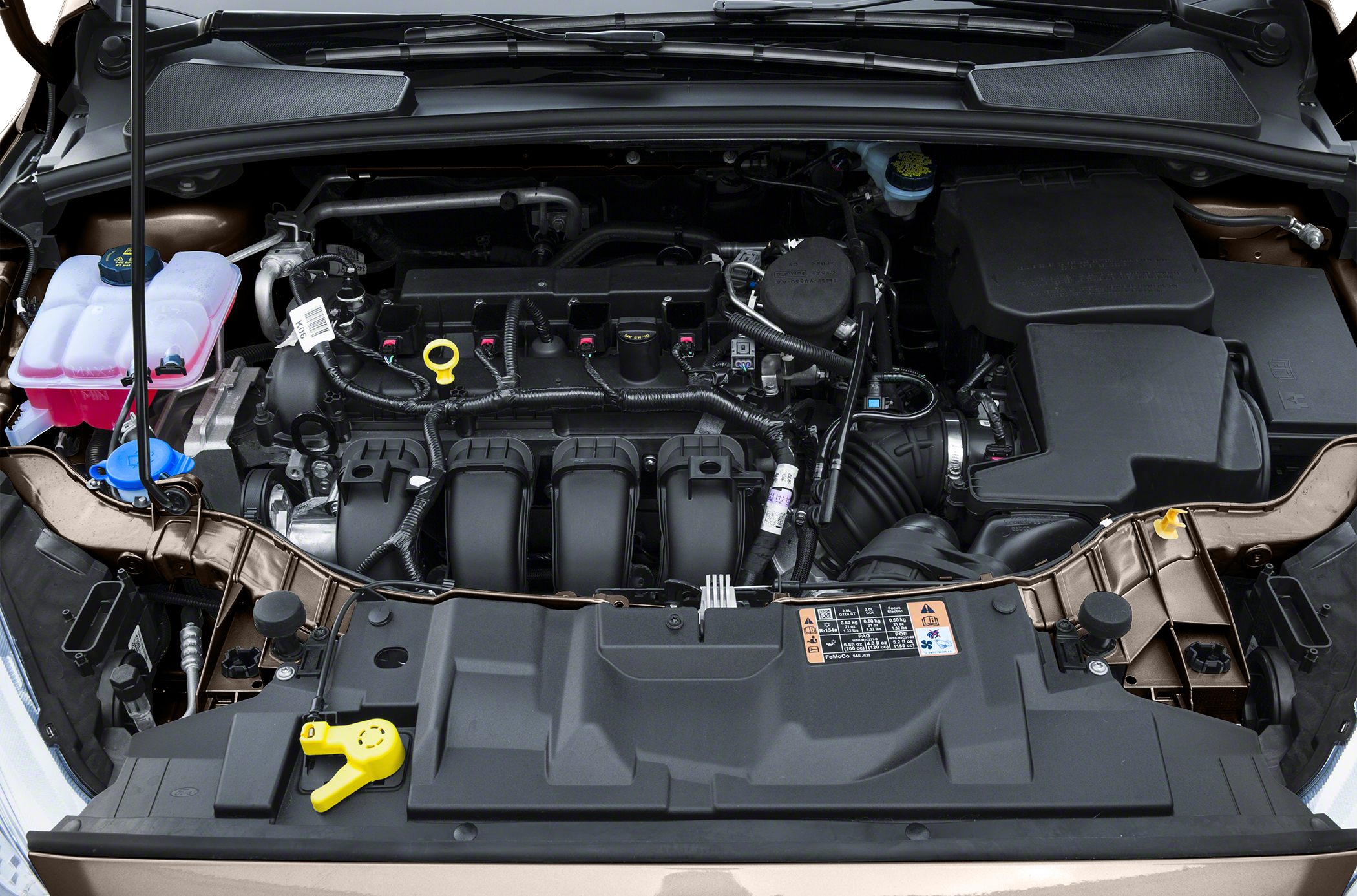 Engine compartment with intake manifold and fluid reservoirs