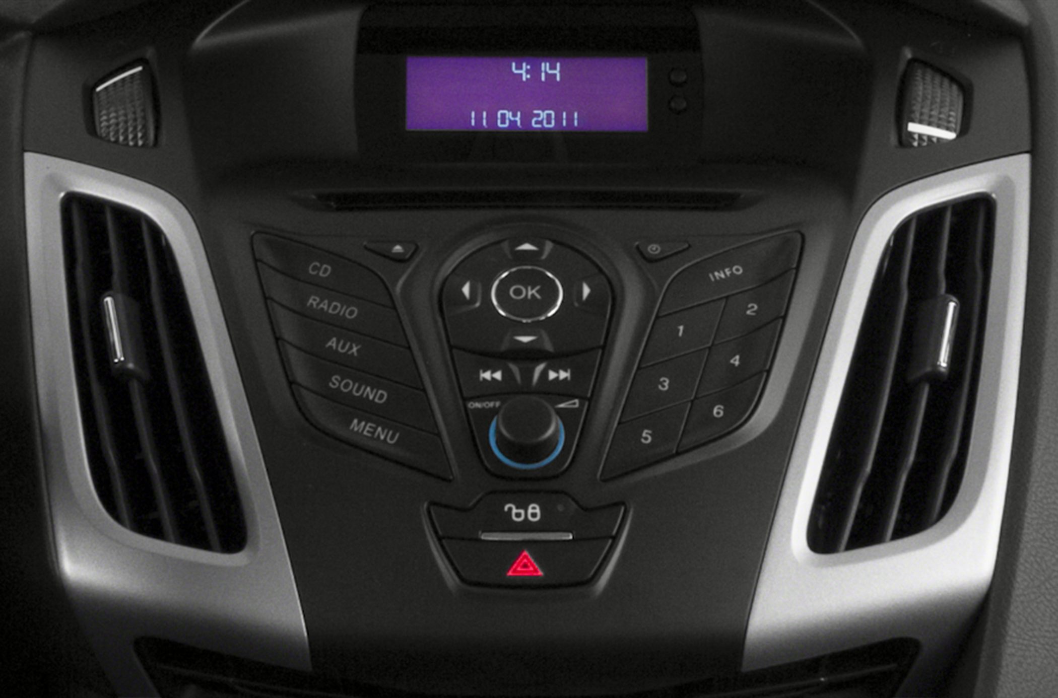 Center console with audio and climate controls, digital display