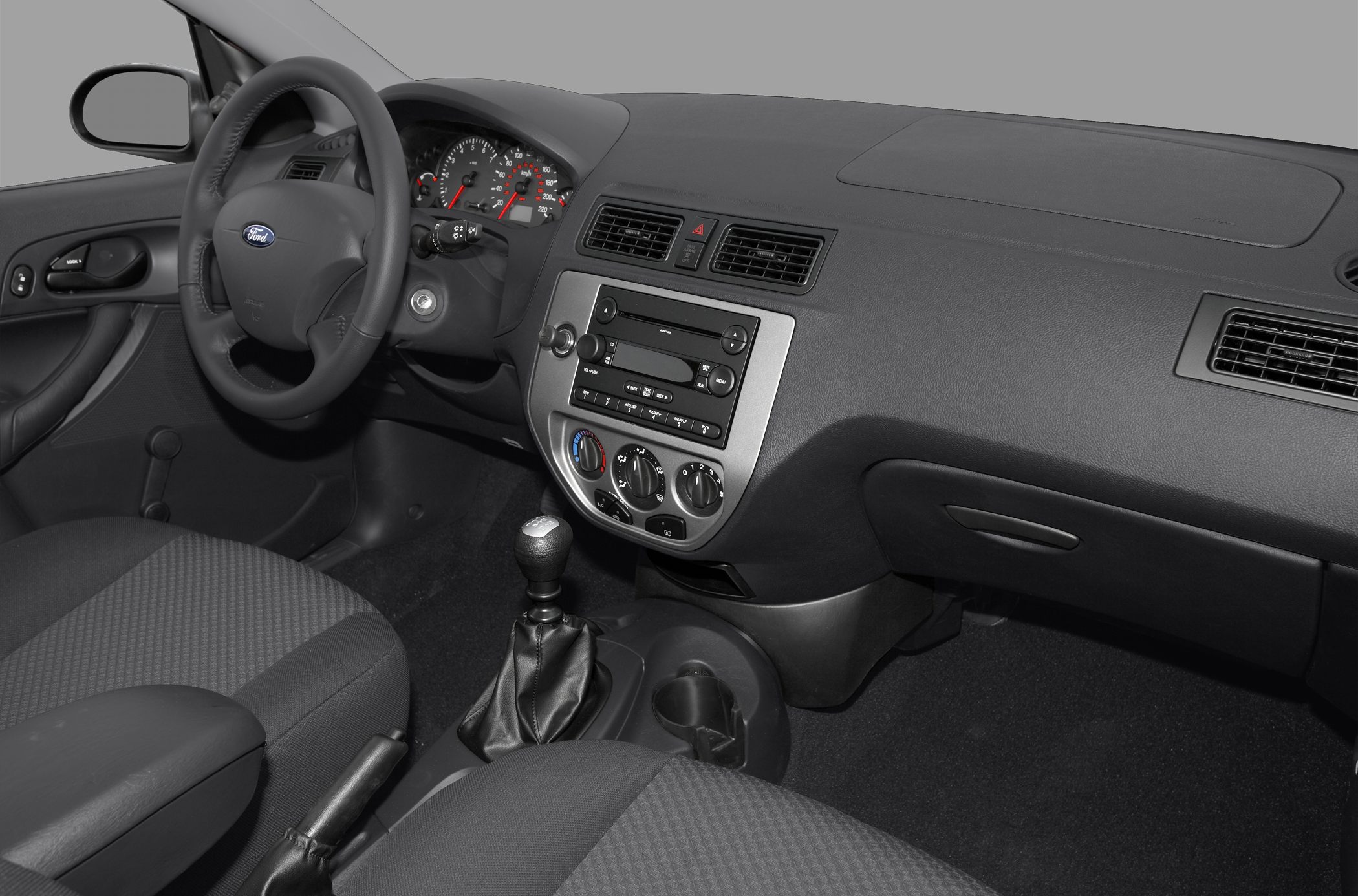 Dashboard and center console with manual gear shift and steering wheel