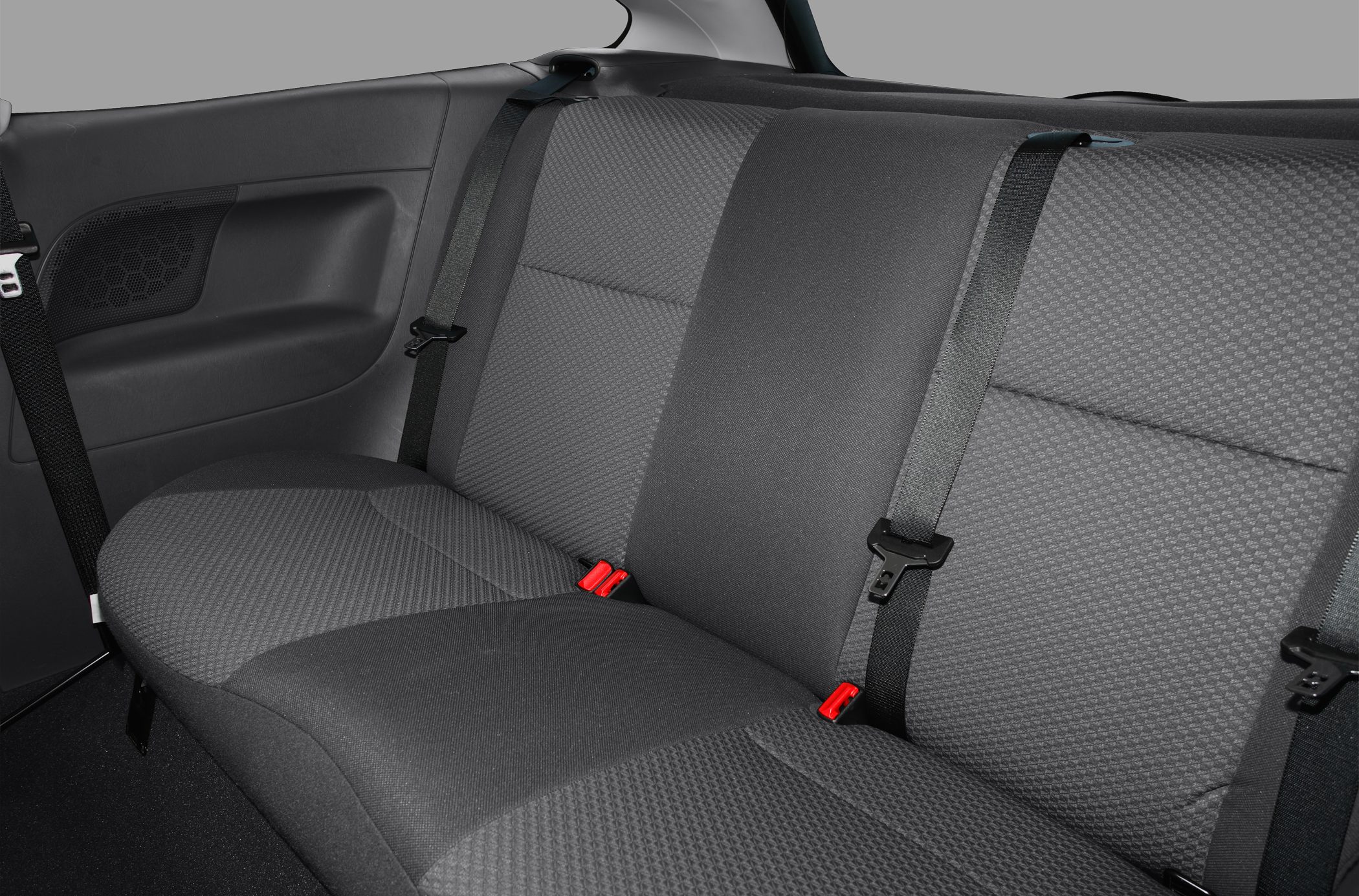 Rear seat fabric upholstery and seat belts close-up