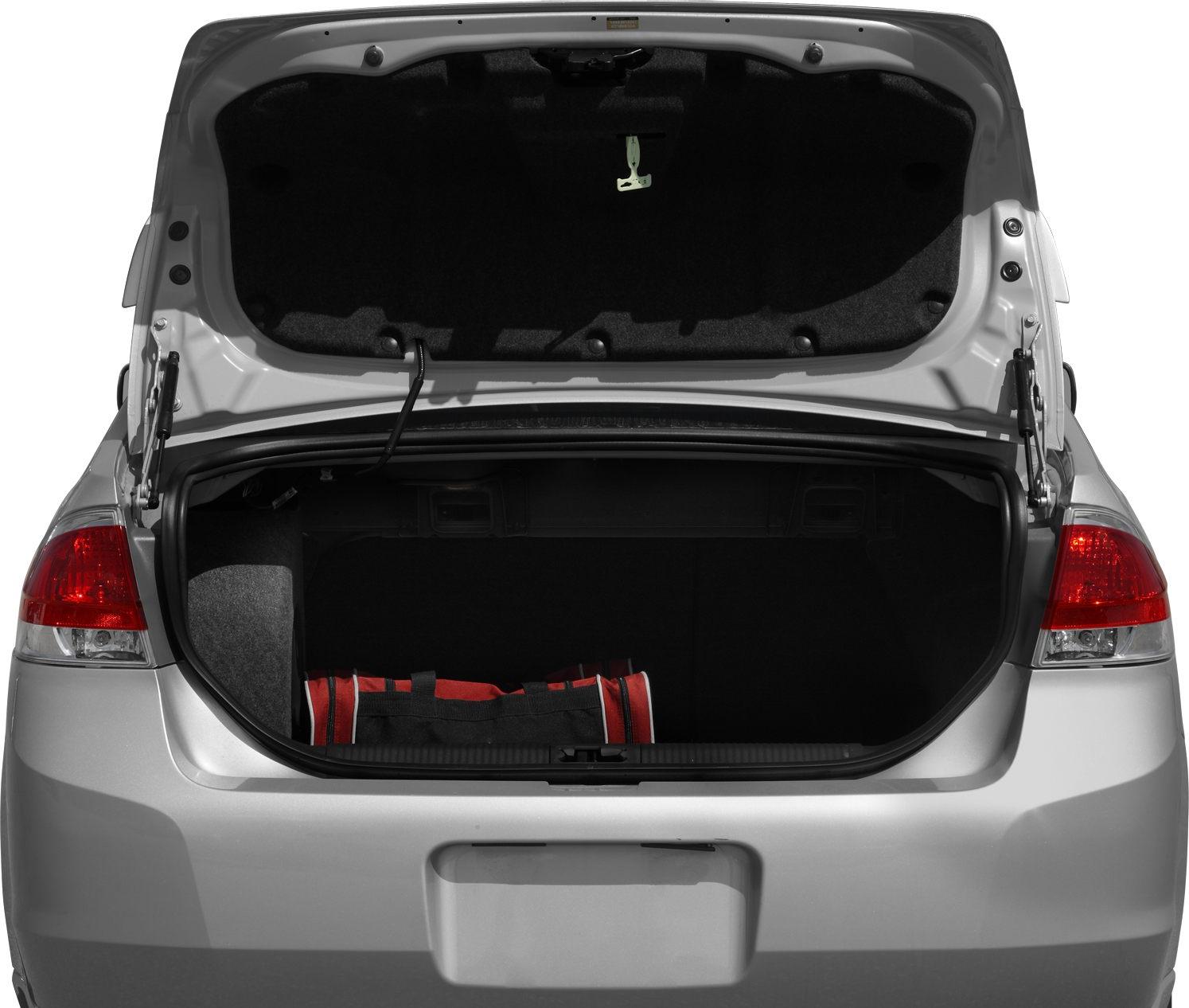 Open trunk with spacious cargo area and visible support hinges.