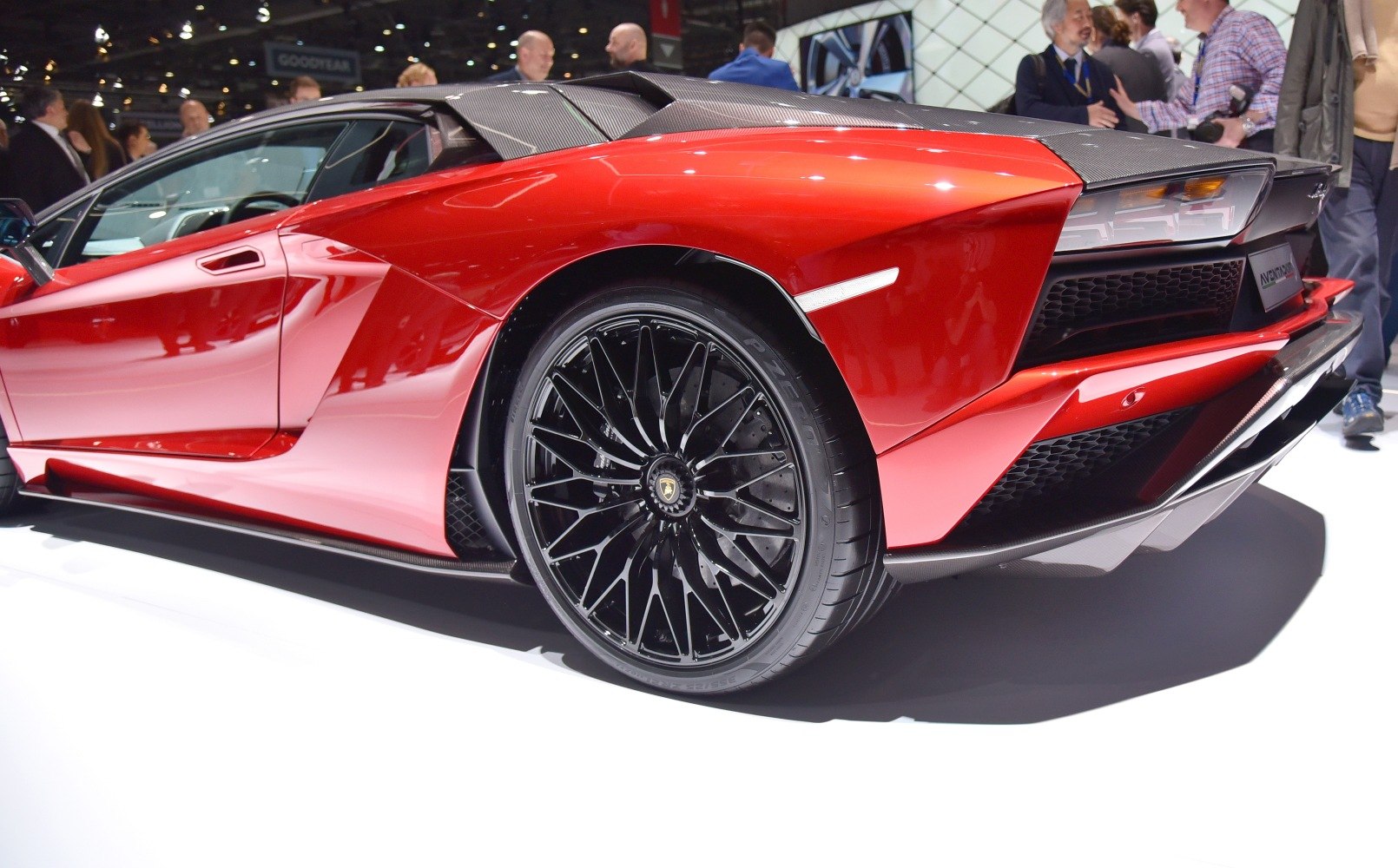Close-up rear-side view with detailed wheel and aerodynamic features