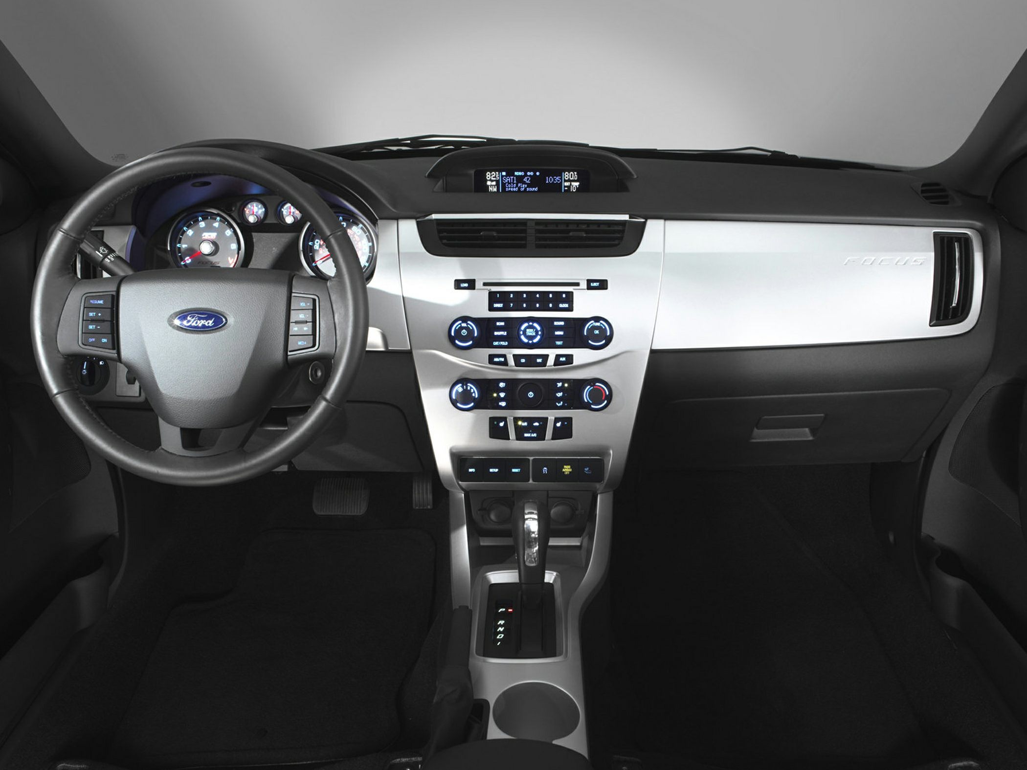 Dashboard and steering wheel with center console controls