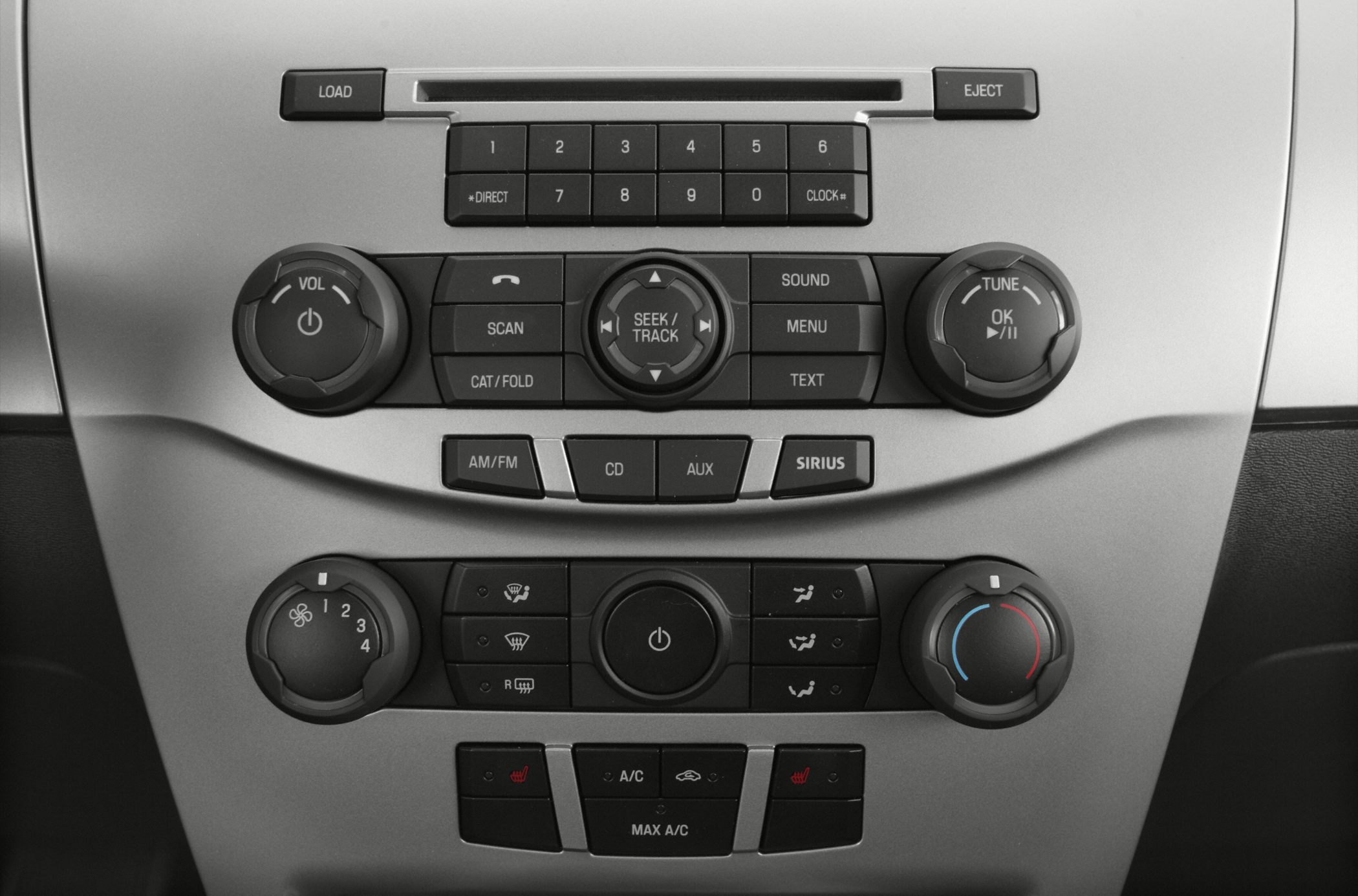 Car audio and climate control panel with buttons, knobs, and settings.