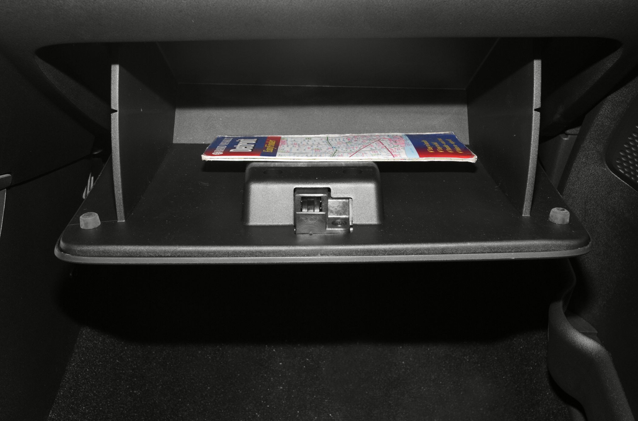Car glove compartment with map inside