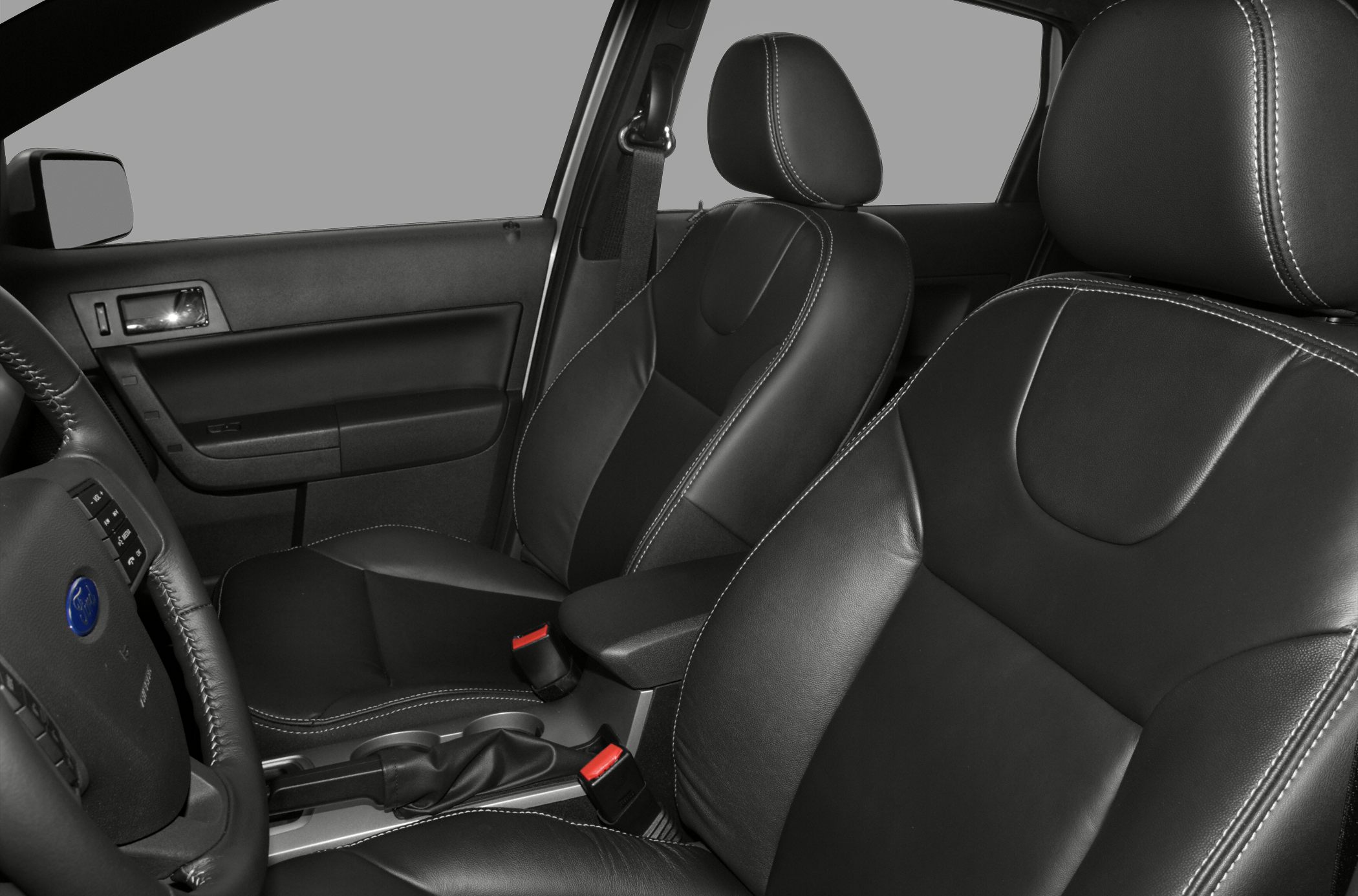 Front leather seats and steering wheel close-up