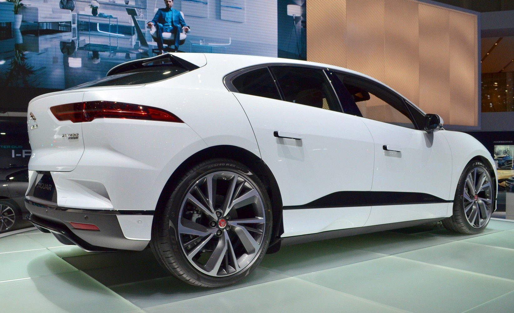 White electric SUV rear and side profile with alloy wheels