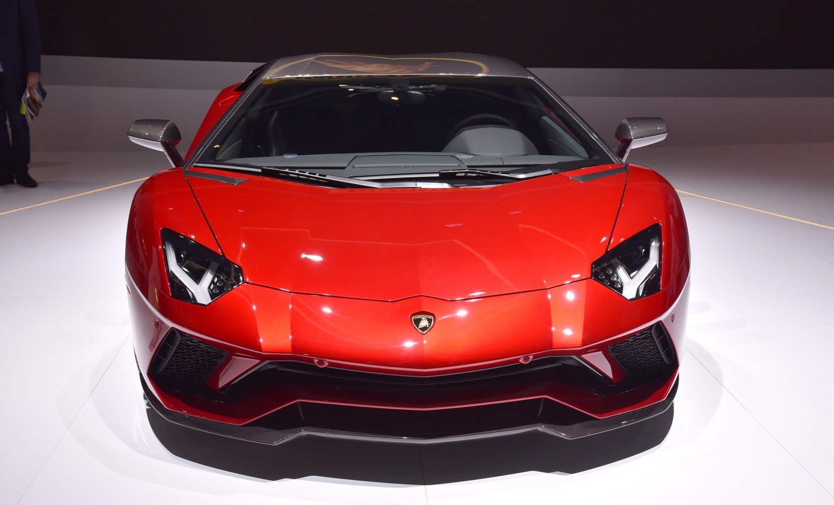 Front view with sharp headlights and aerodynamic hood design.
