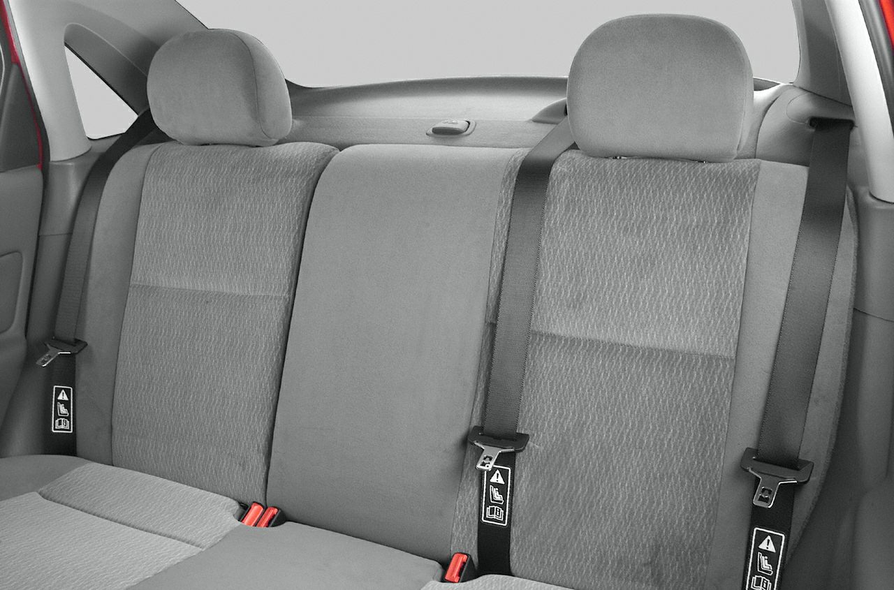 Rear seat upholstery with headrests and seat belts