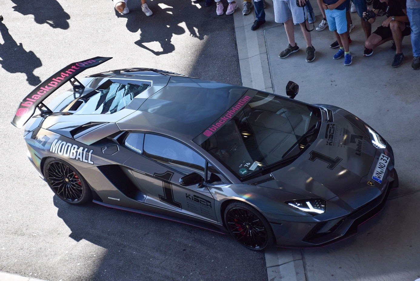 Lamborghini with large rear wing and racing decals
