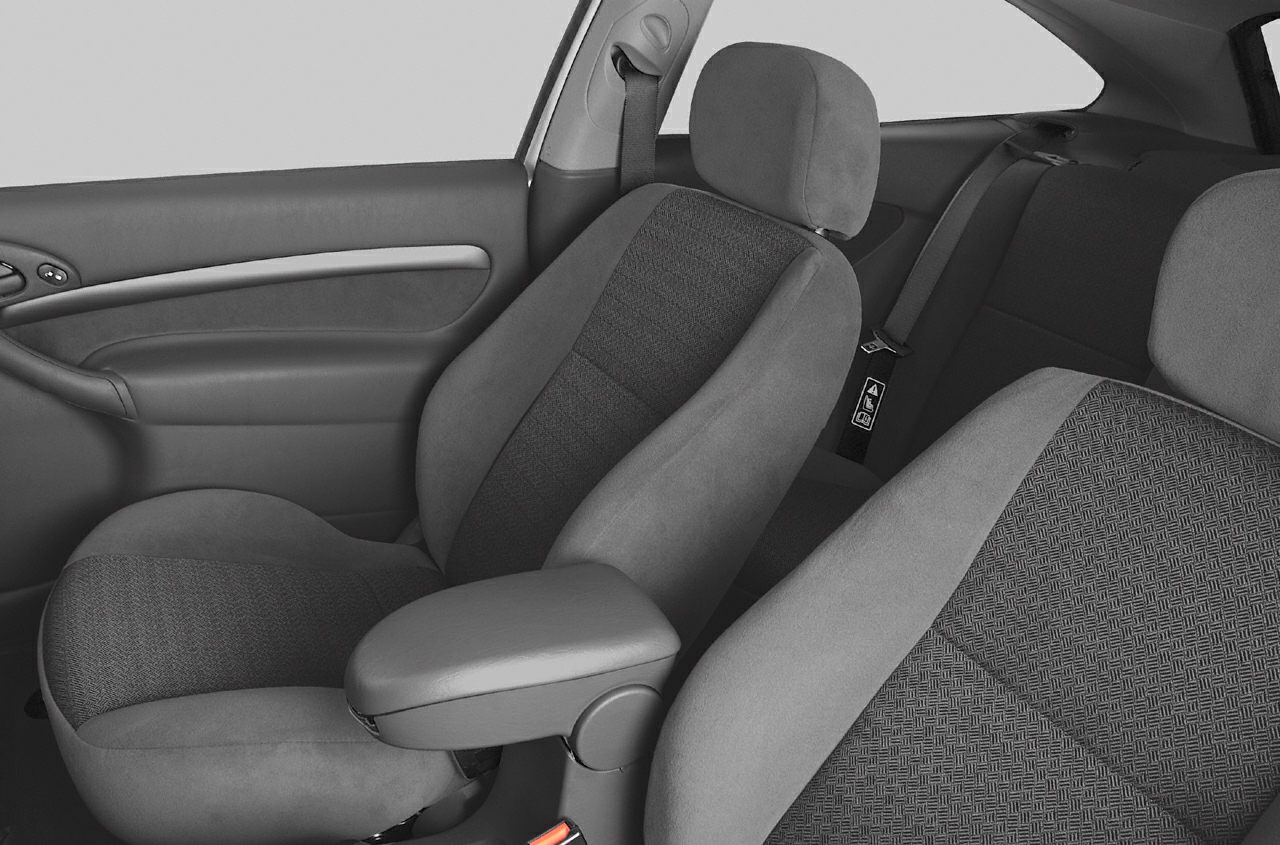Front seats and door panel upholstery with headrests and armrest