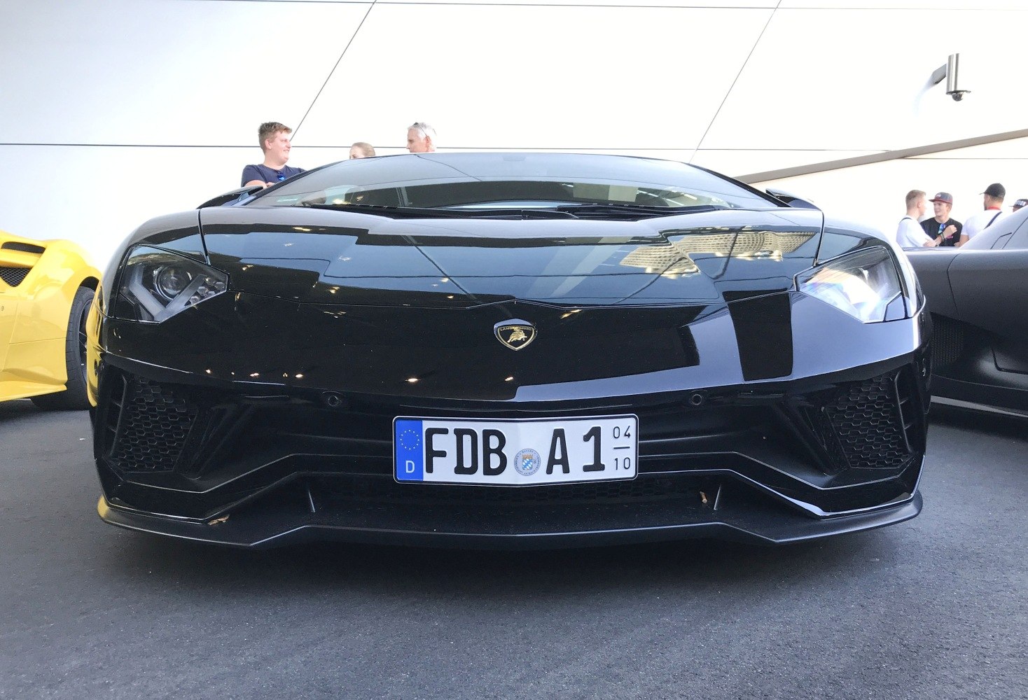 Front view with distinctive headlights and aggressive bumper design.