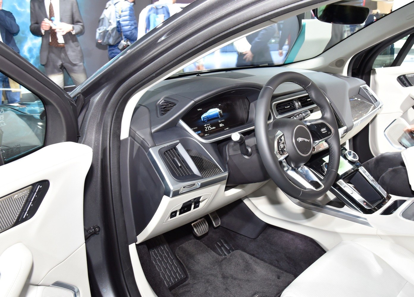 Steering wheel, dashboard, and digital driver display in luxury vehicle interior