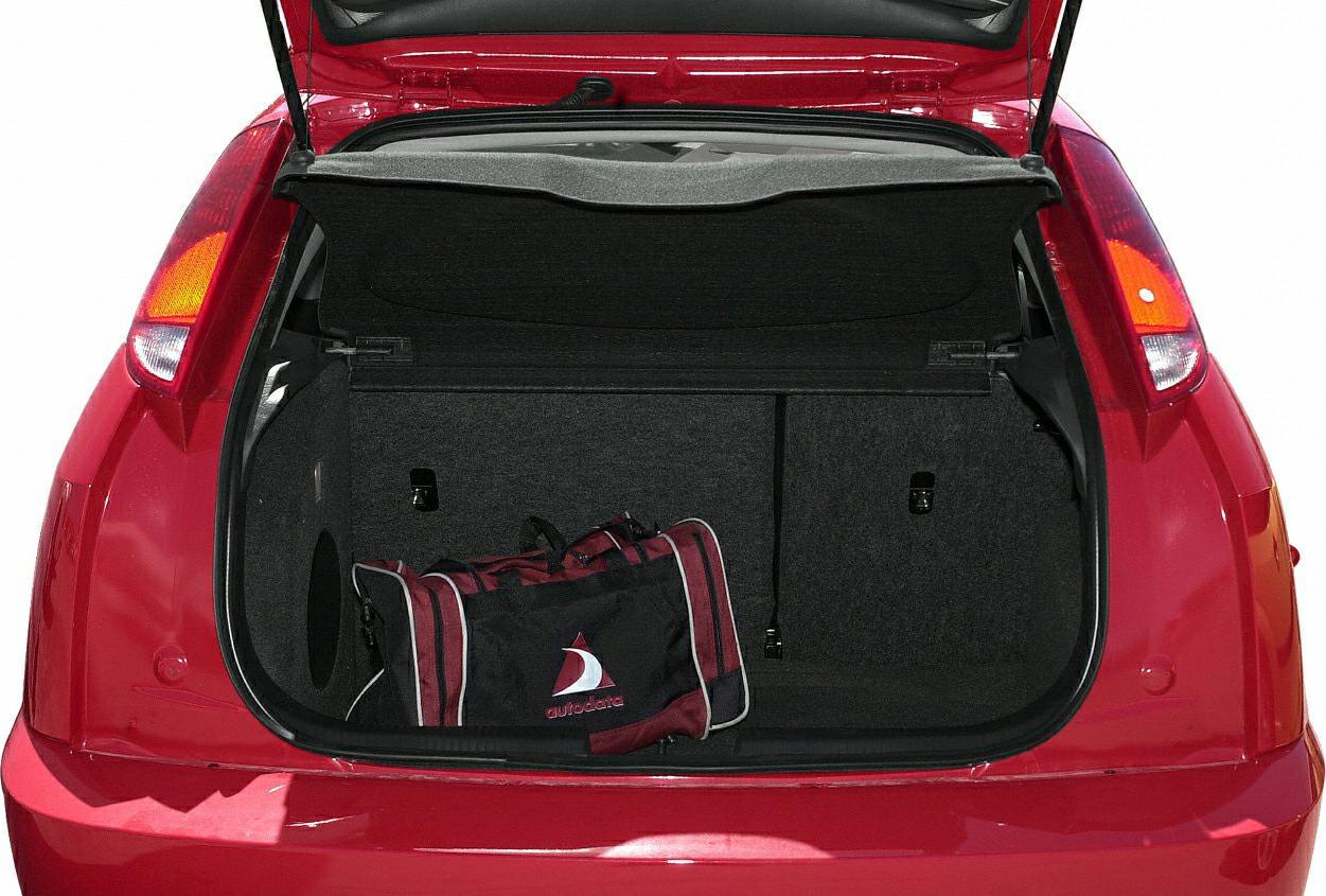 Open hatchback trunk with red and black bag