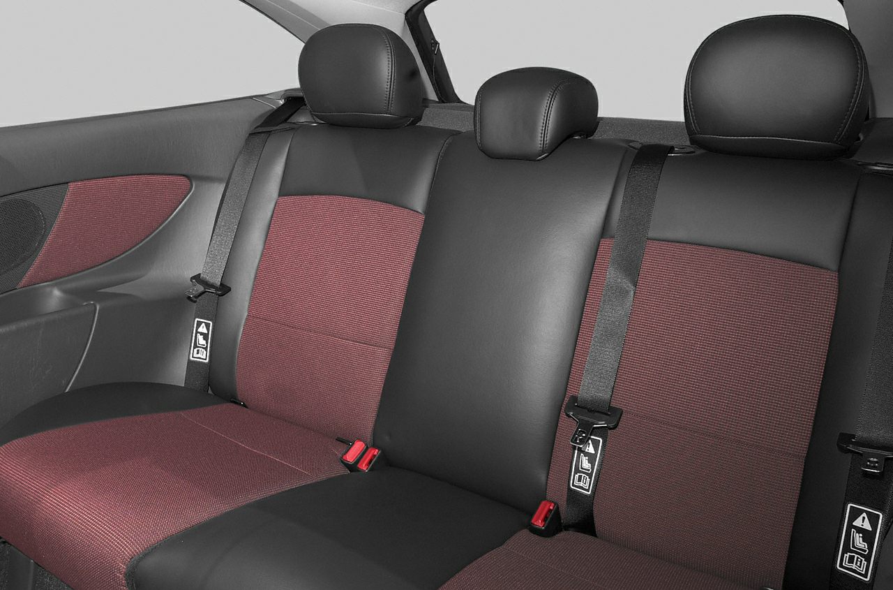 Rear seat with dual-tone upholstery and headrests