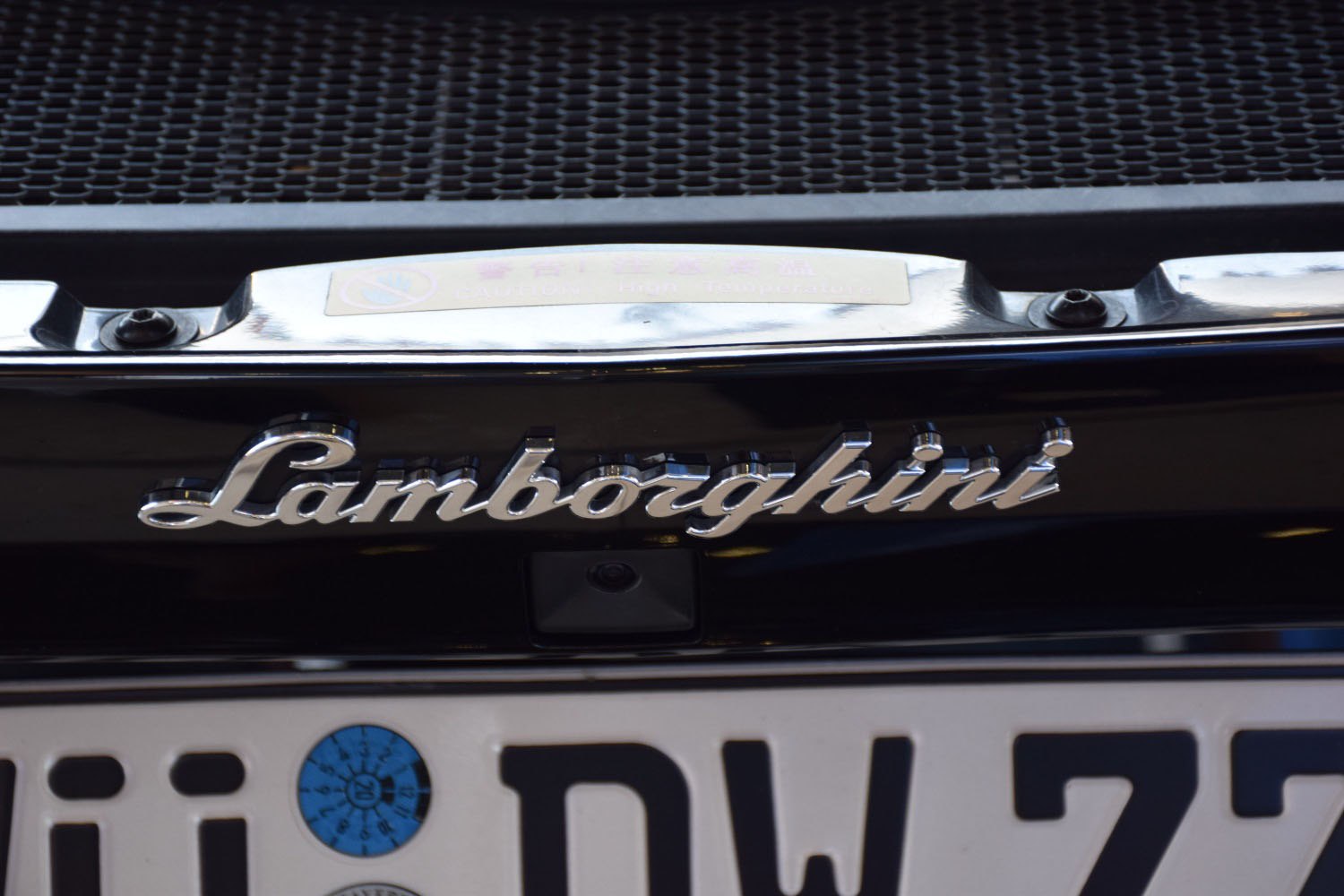 Close-up of Lamborghini rear emblem and license plate section