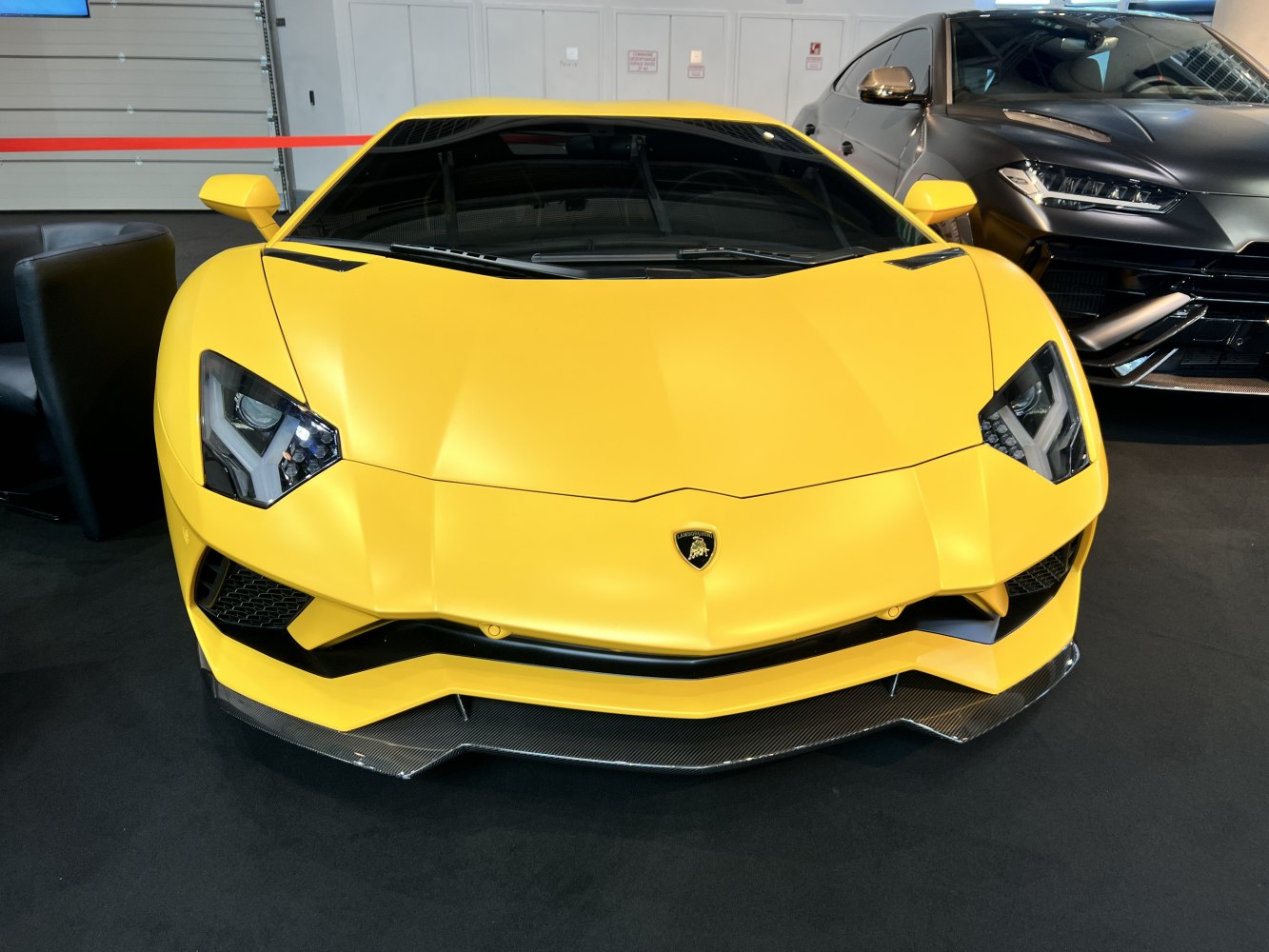 Aggressive front fascia with distinctive headlights and carbon fiber splitter
