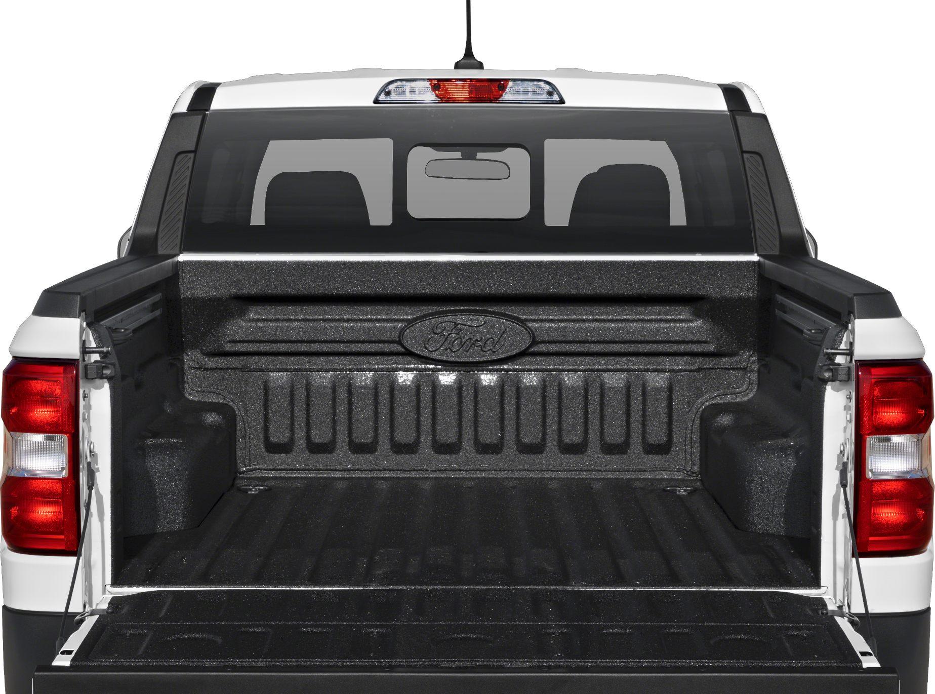 Open truck bed with protective liner and Ford logo.
