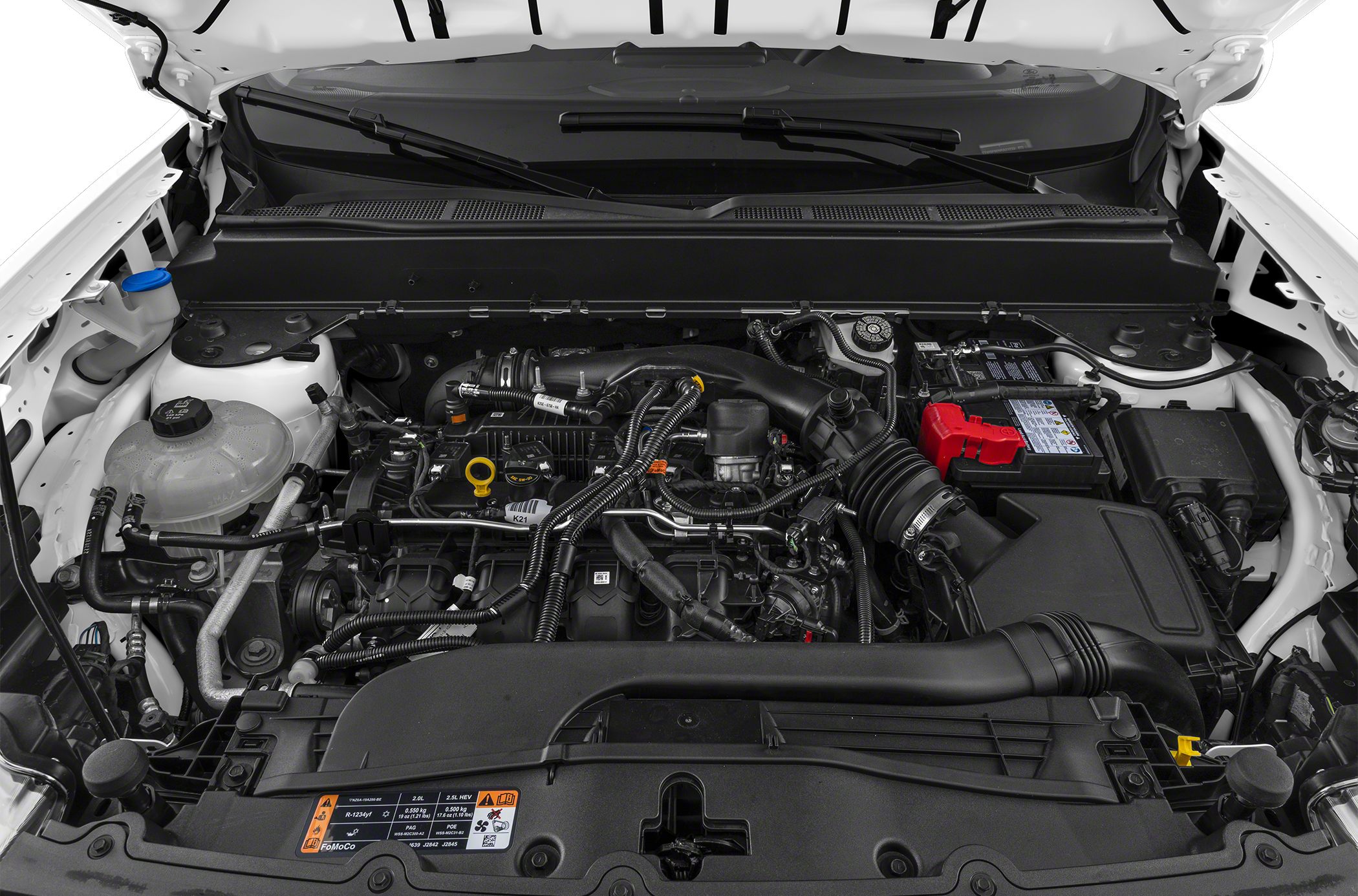 Close-up of engine bay with wiring and components