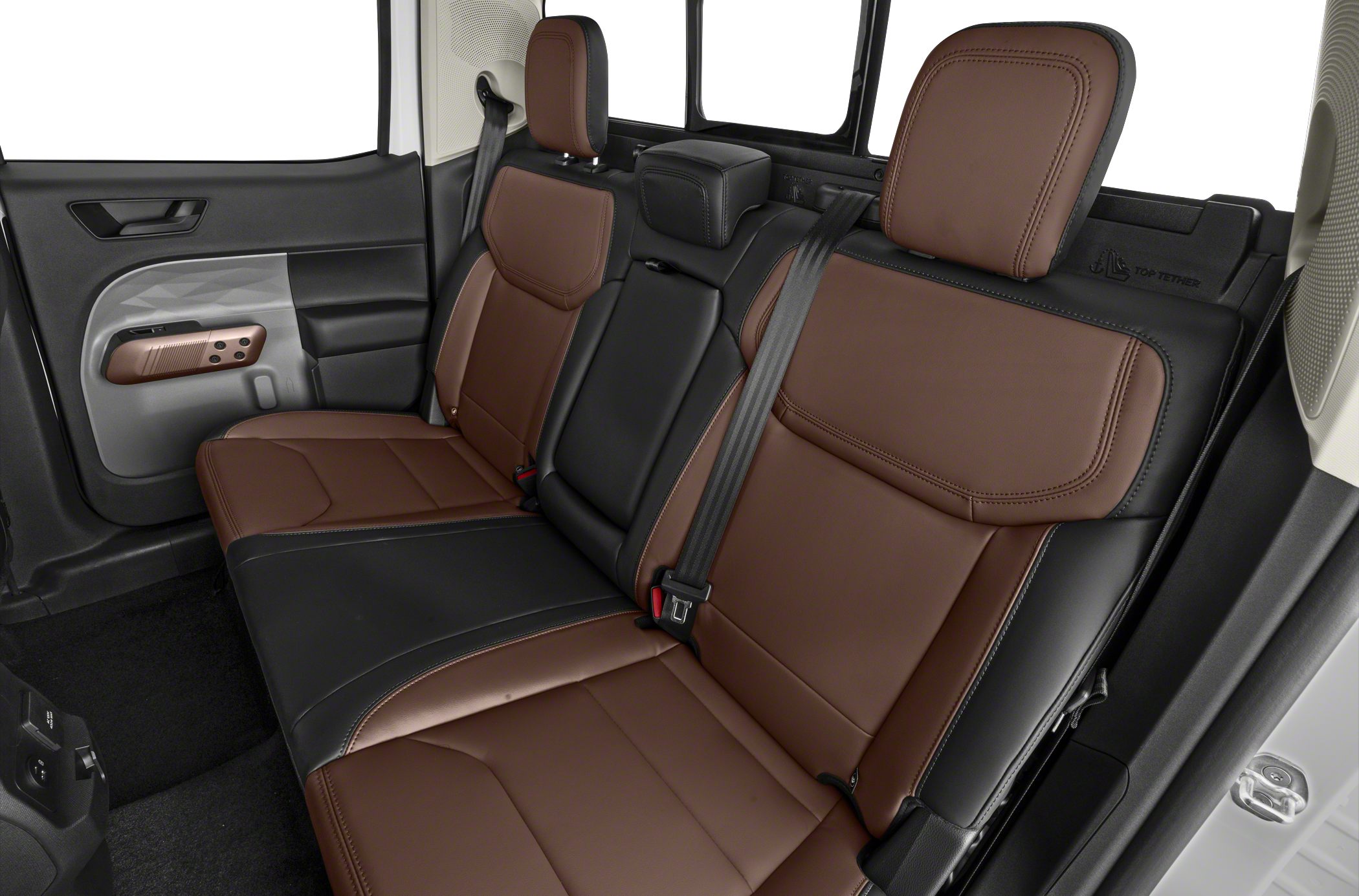 Two-tone brown and black leather rear seat with integrated headrests