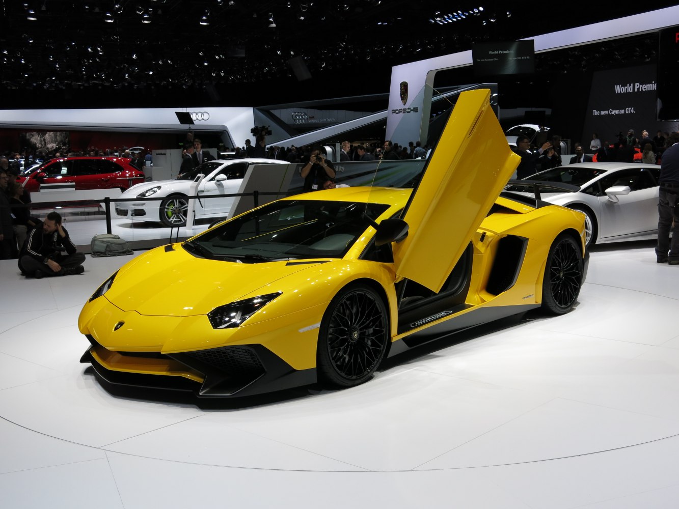 Yellow sports car with scissor door open