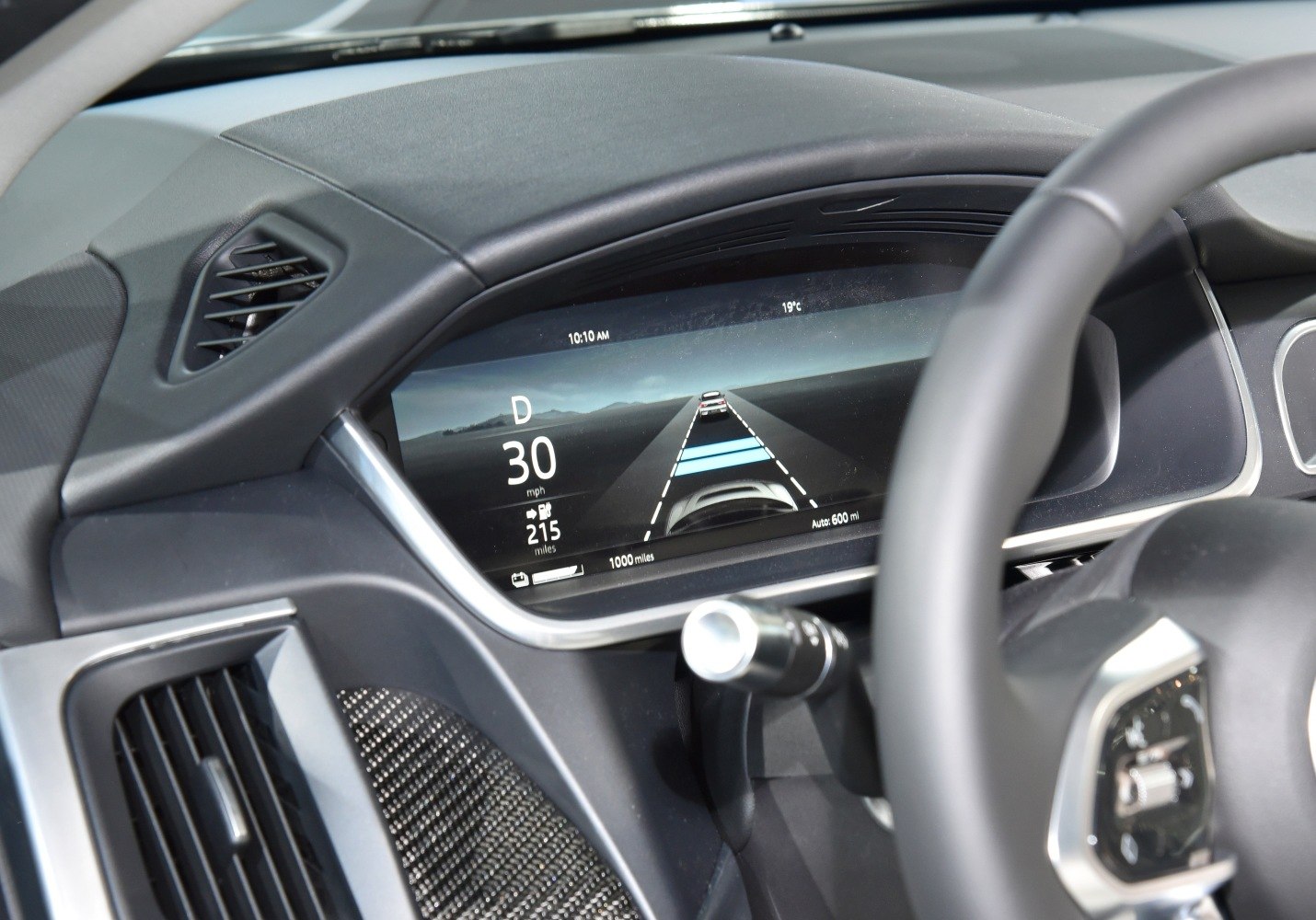 Digital instrument cluster with driving assist display showing speed and lane guidance