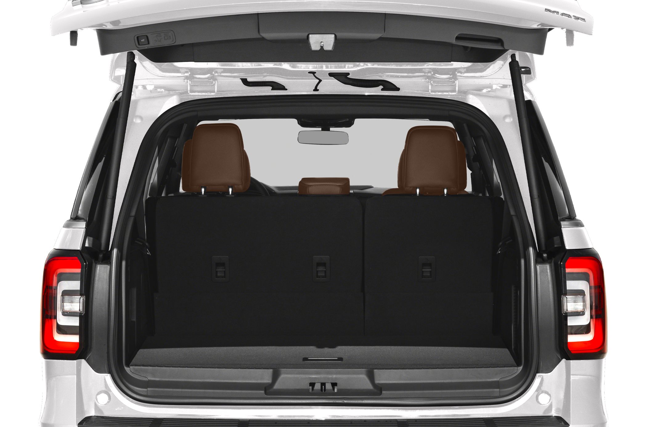Spacious rear cargo area with premium brown leather seats