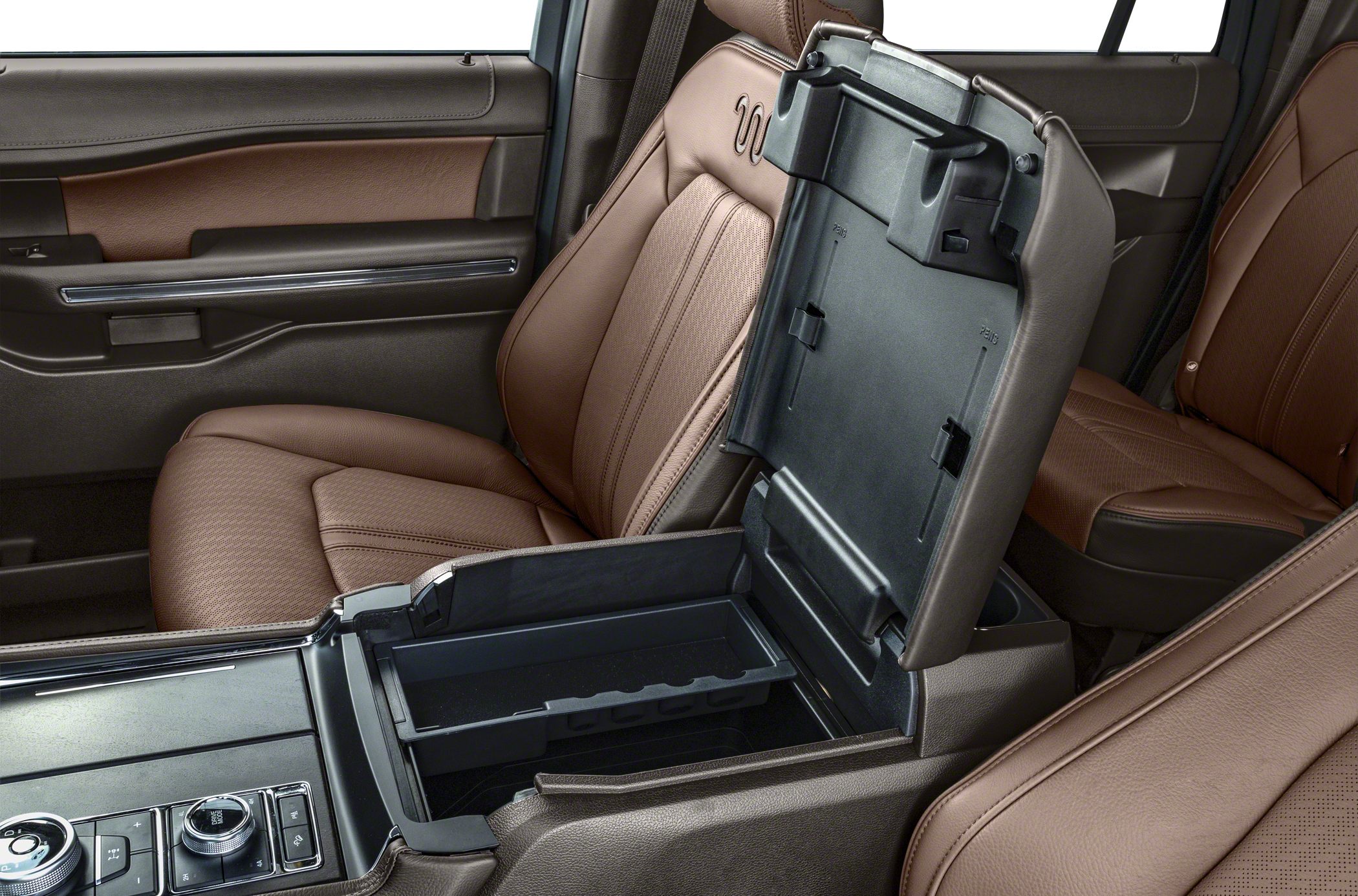 Brown leather seats with open center console storage compartment